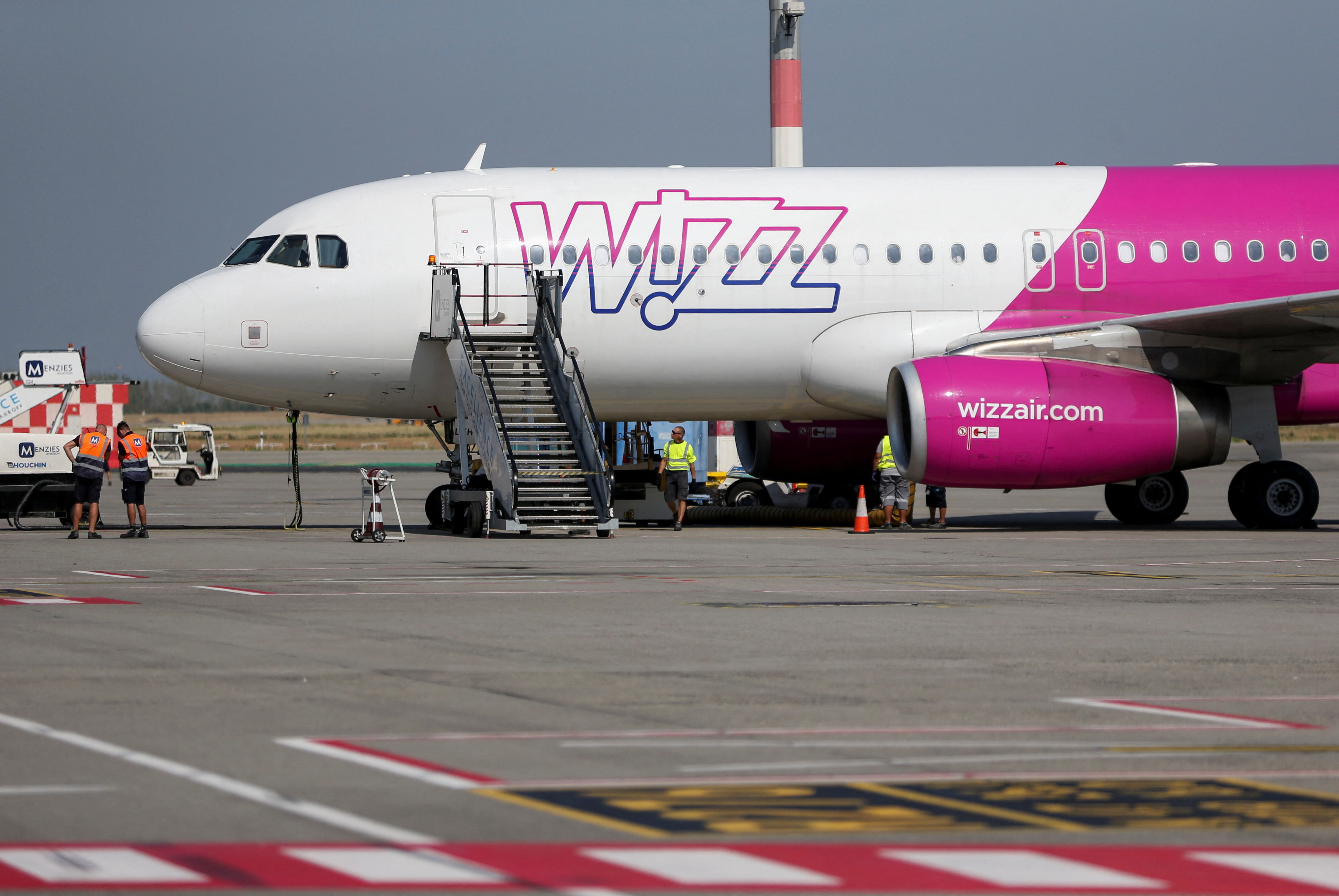 Wizz Air's aircraft is parked on the tarmac at Ferenc Liszt International Airport in Budapest