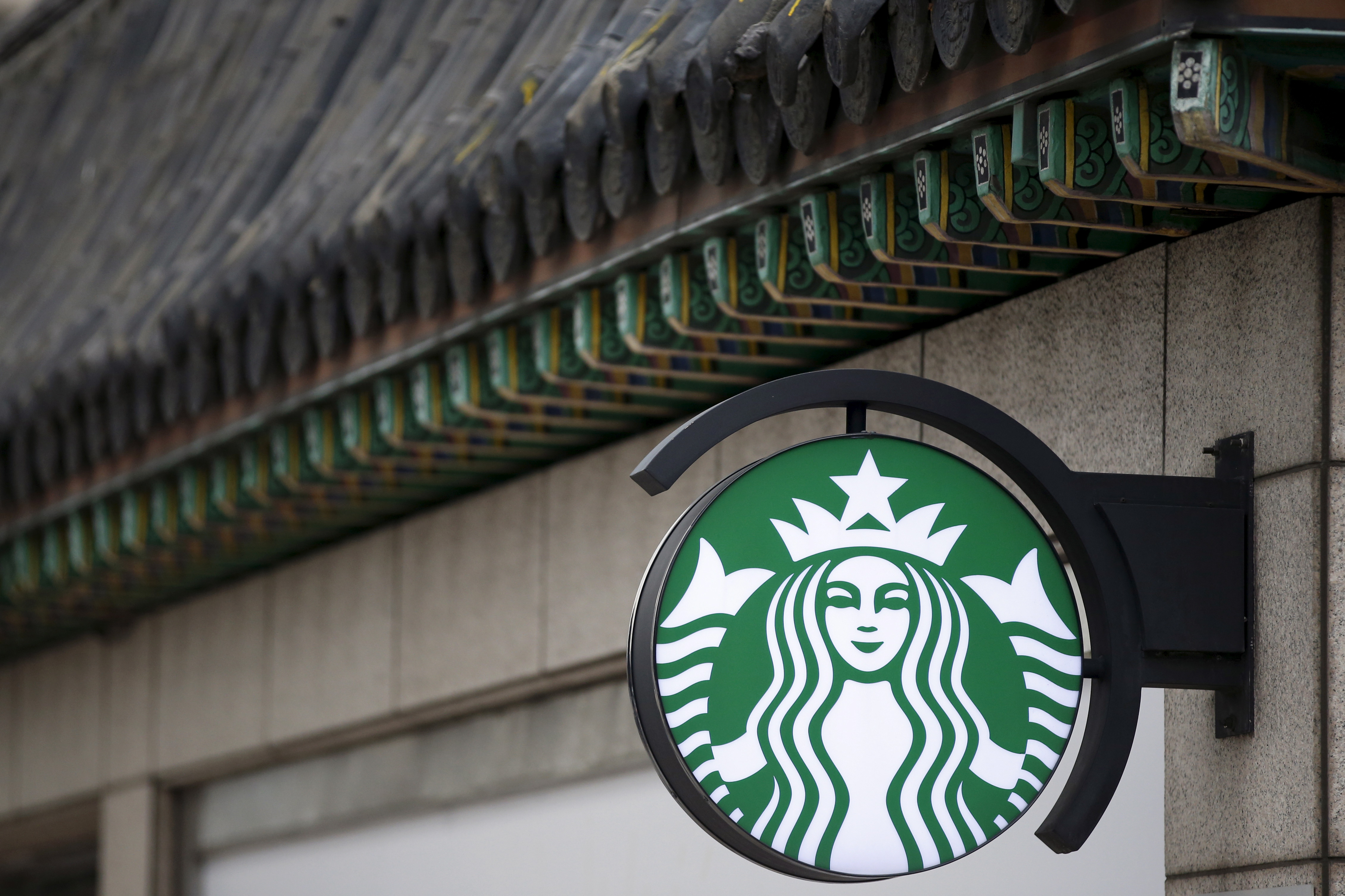 A Starbucks logo is seen at a Starbucks coffee shop in Seoul