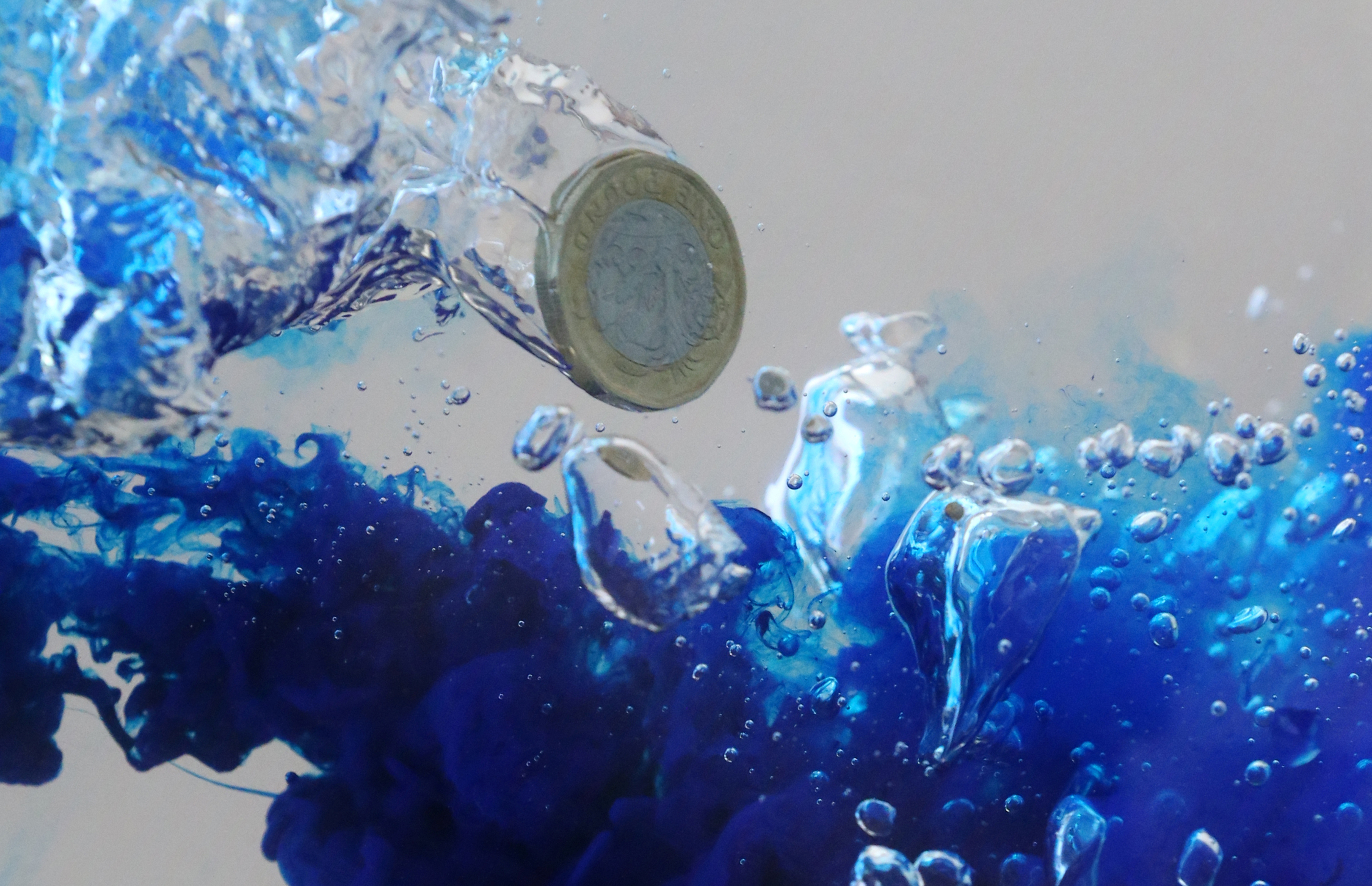 Poltics UK pound coin plunges into water in this illustration picture