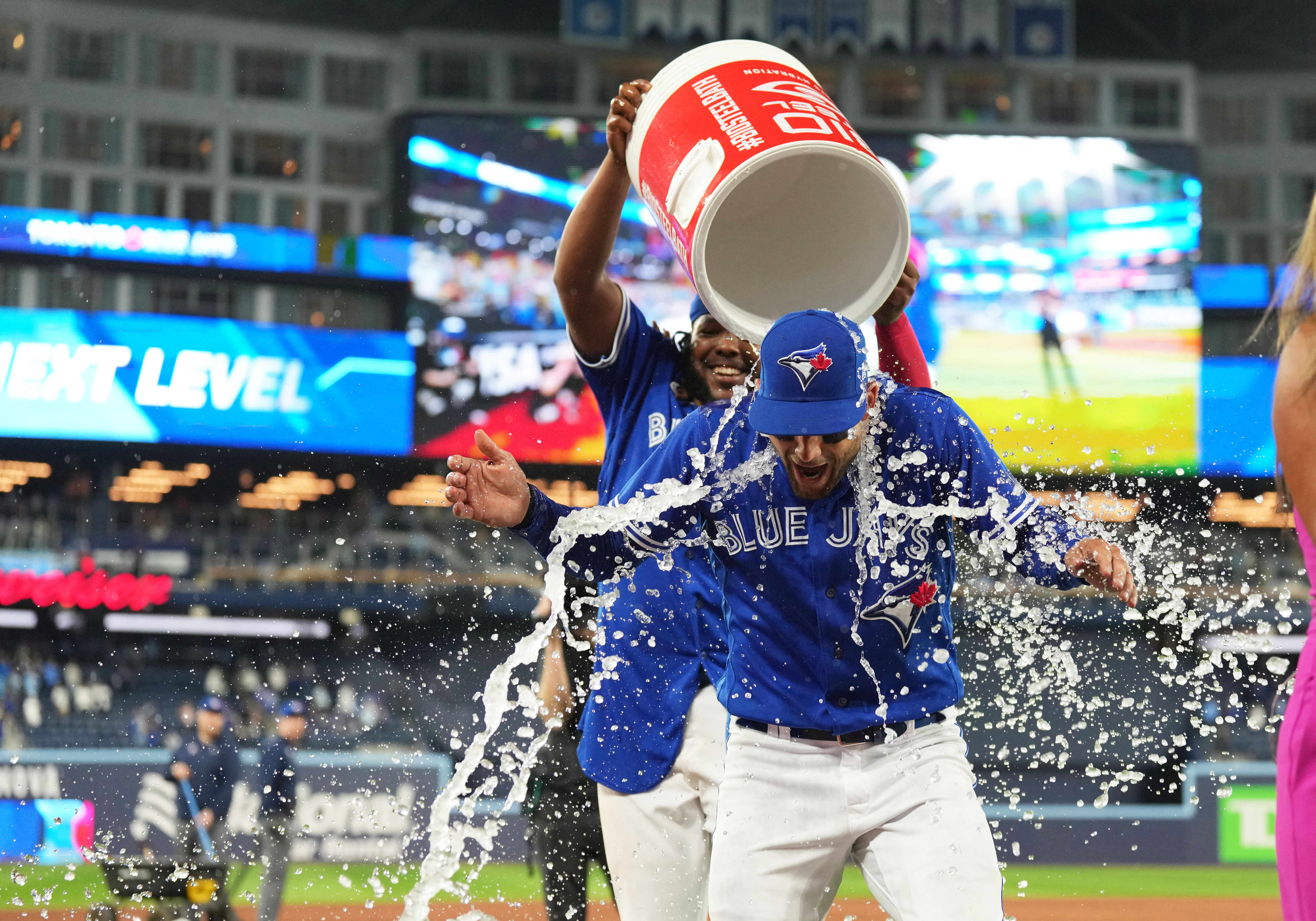 Toronto Blue Jays' Daulton Varsho (25) celebrates his solo home