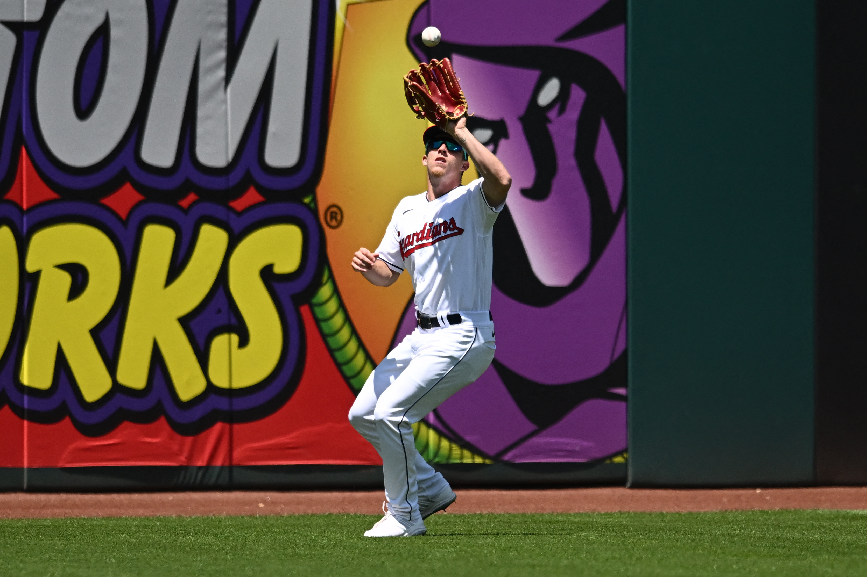 Atlanta Braves left fielder Eddie Rosario catches a fly ball for an out  against Cleveland Guardians' Jose Ramirez in the first inning of a baseball  game Monday, July 3, 2023, in Cleveland. (