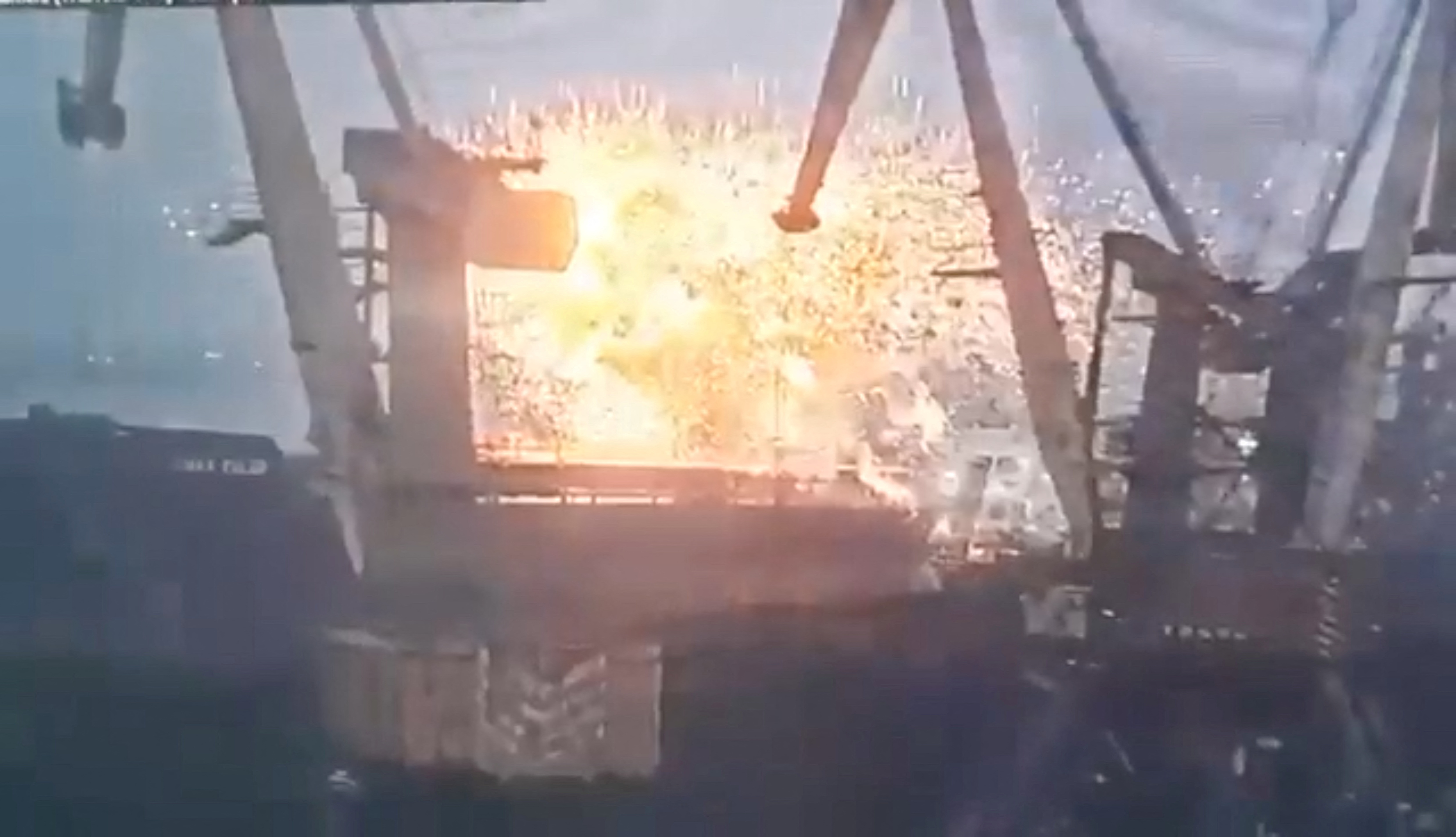 Screen grab obtained from social media shows the moment of a missile strike on a Liberian-flagged civilian ship in a Ukrainian port
