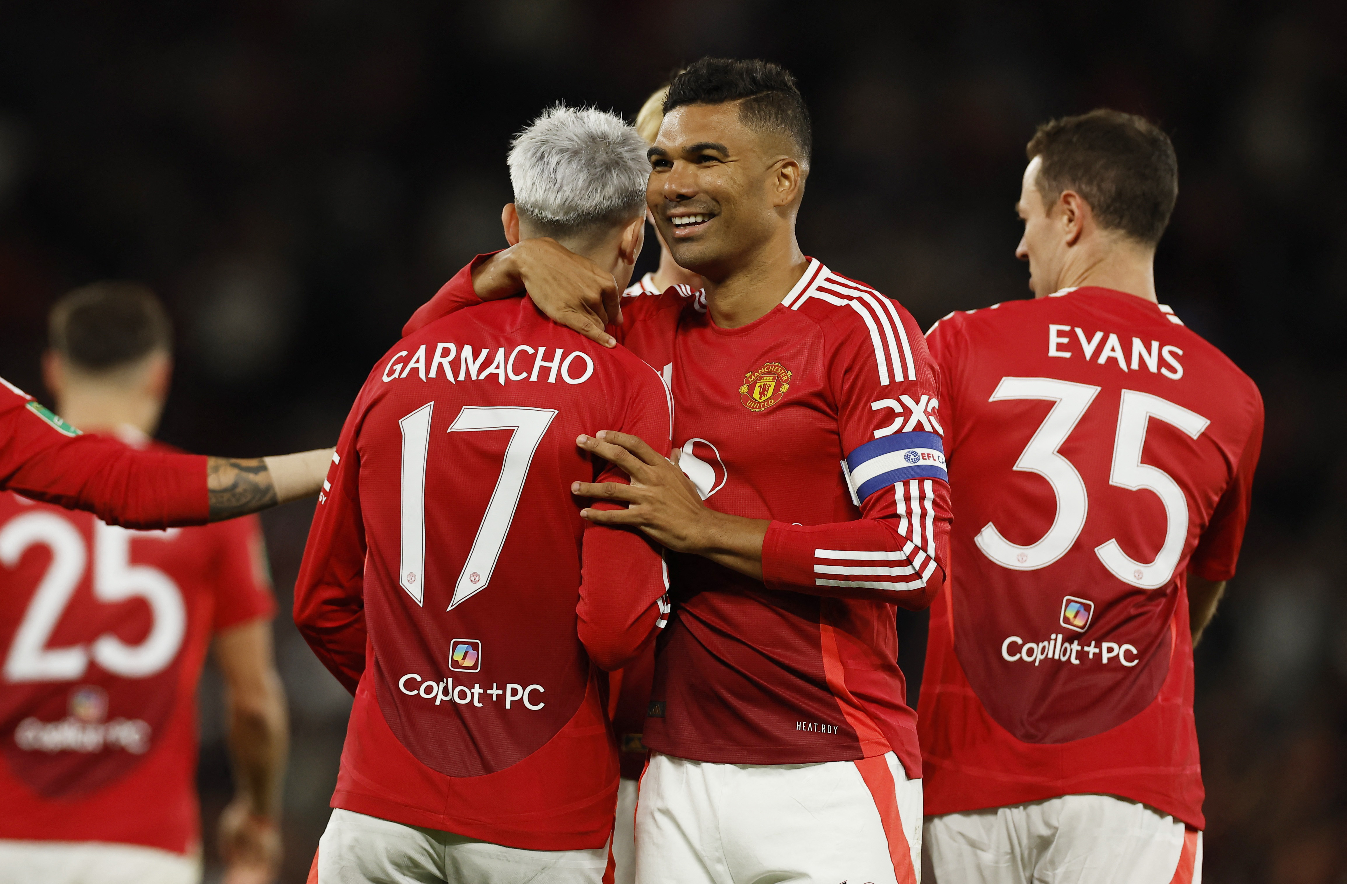  Soccer Football - Carabao Cup - Third Round - Manchester United v Barnsley - Old Trafford, Manchester, Britain - September 17, 2024 Manchester United's Alejandro Garnacho celebrates scoring their fourth goal with Casemiro Action Images via Reuters/Jason Cairnduff 