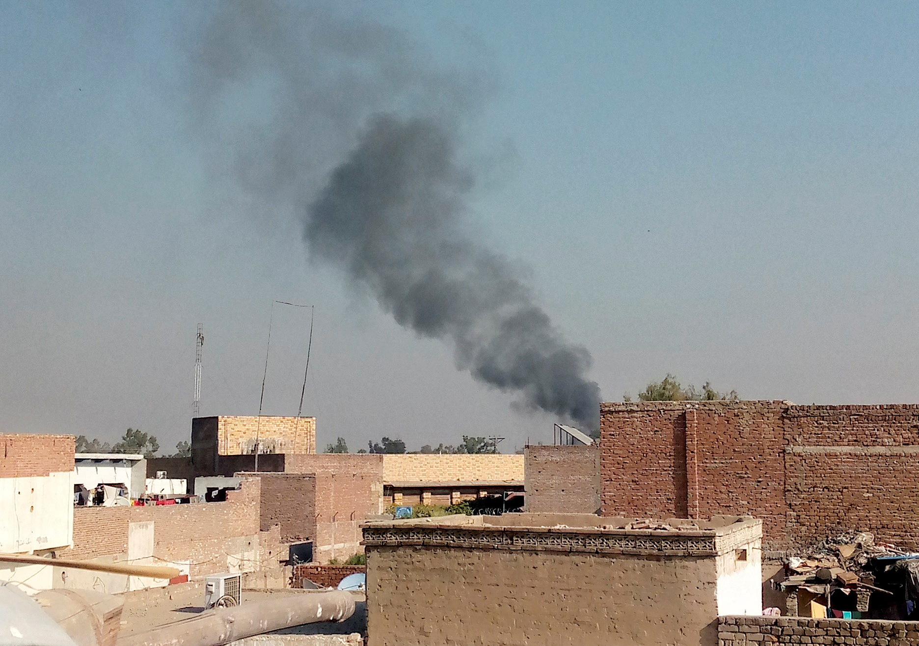 Smoke rises from the cantonment area in Bannu