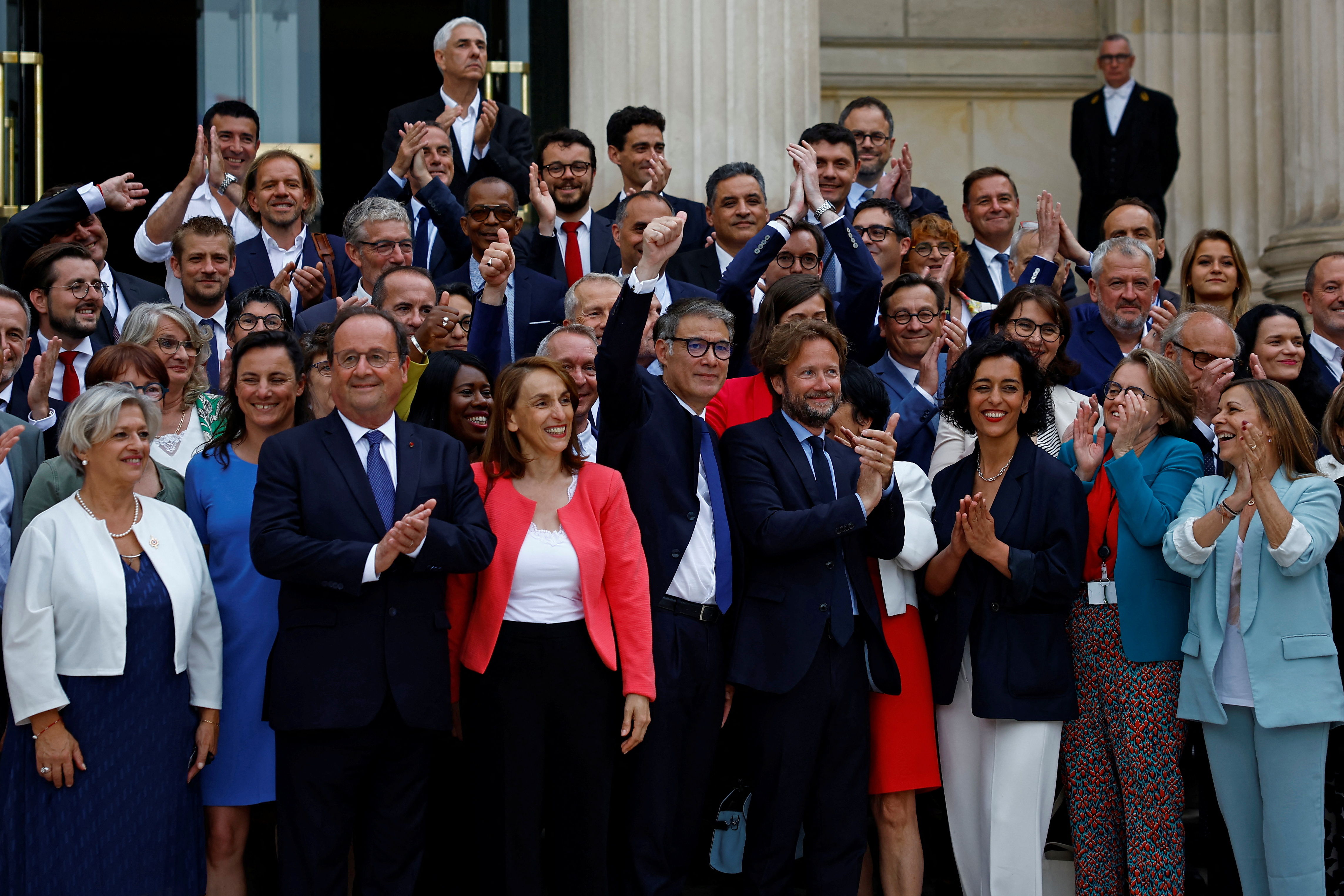 Newly-elected lawmakers make entry to the National Assembly in Paris
