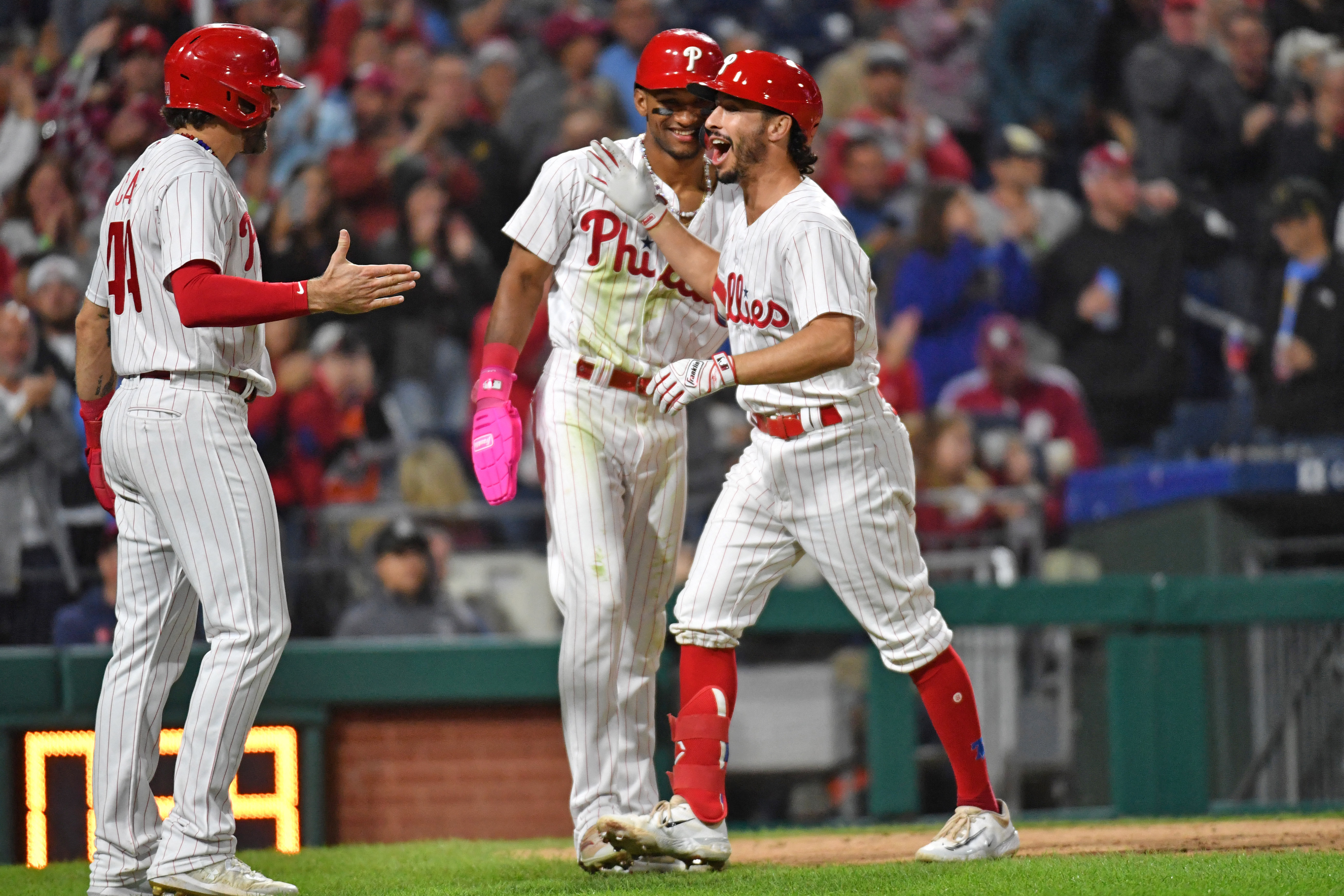 Phillies claw back from five down to best Pirates