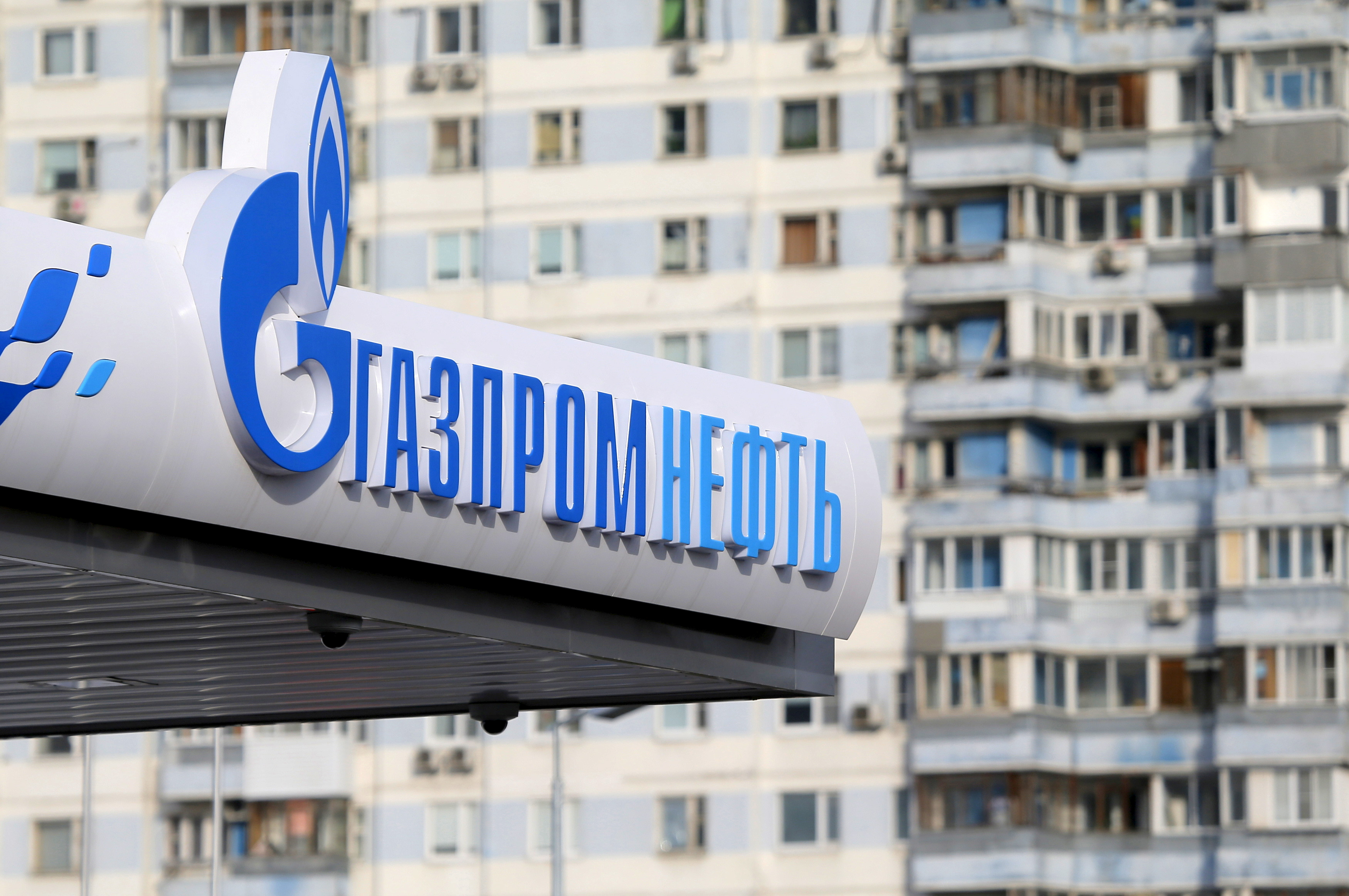 A logo of Gazprom Neft oil company is seen at a petrol station in Moscow, Russia, March 11, 2016. REUTERS/Maxim Shemetov/File Photo        