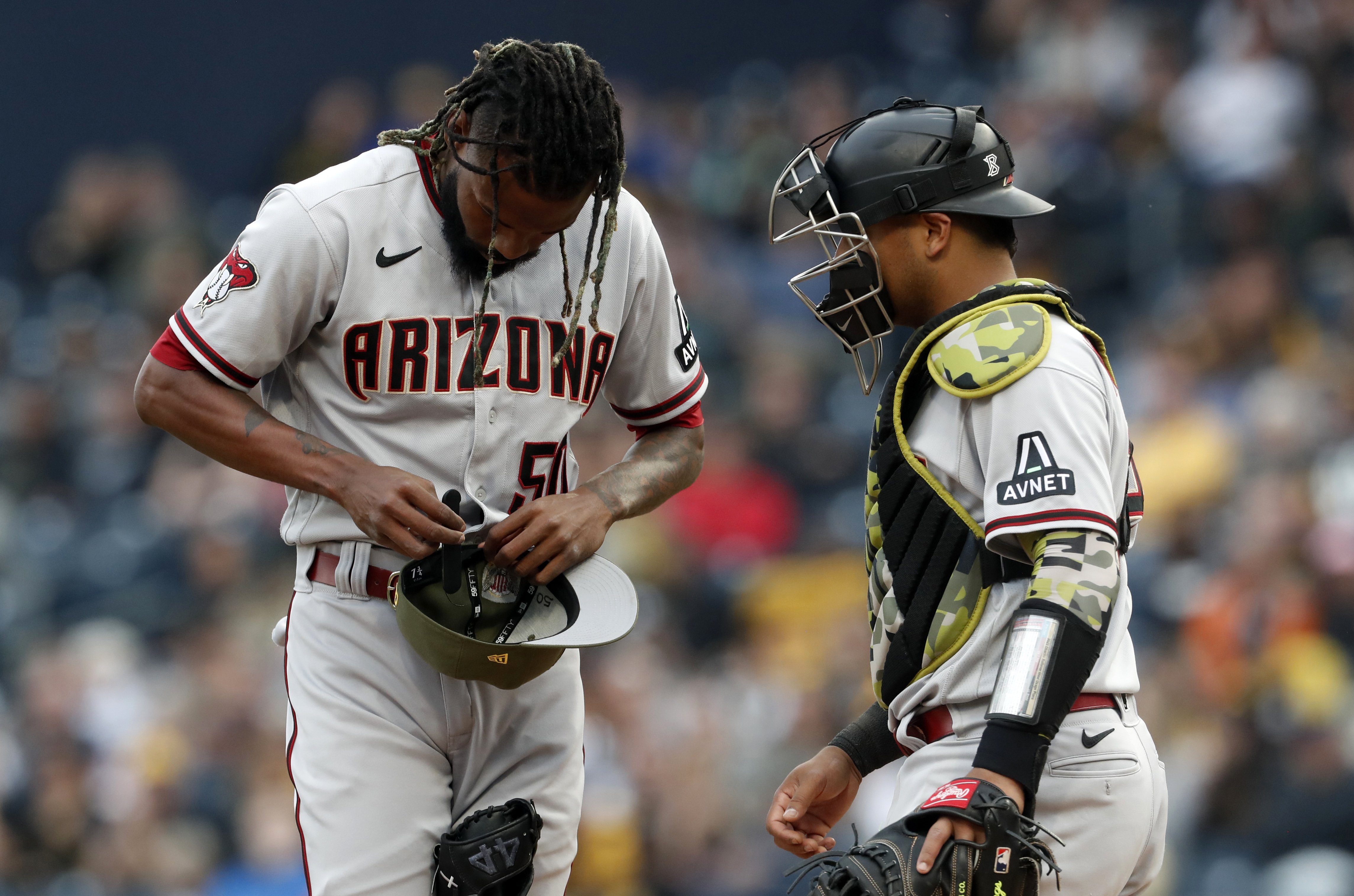 Diamondbacks edge Pirates 4-3 on Pavin Smith's blast