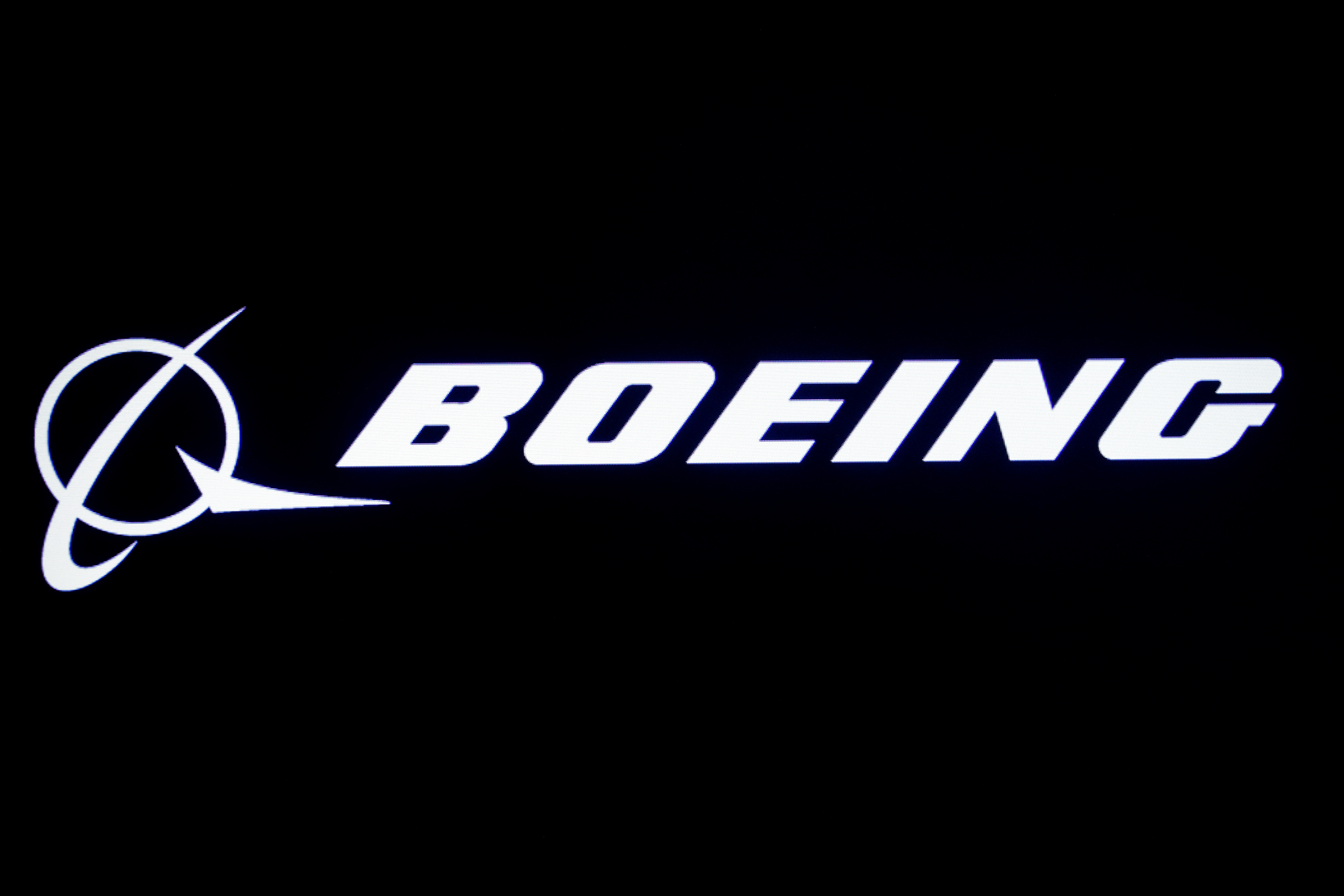 The Boeing logo is displayed on a screen, at the NYSE in New York
