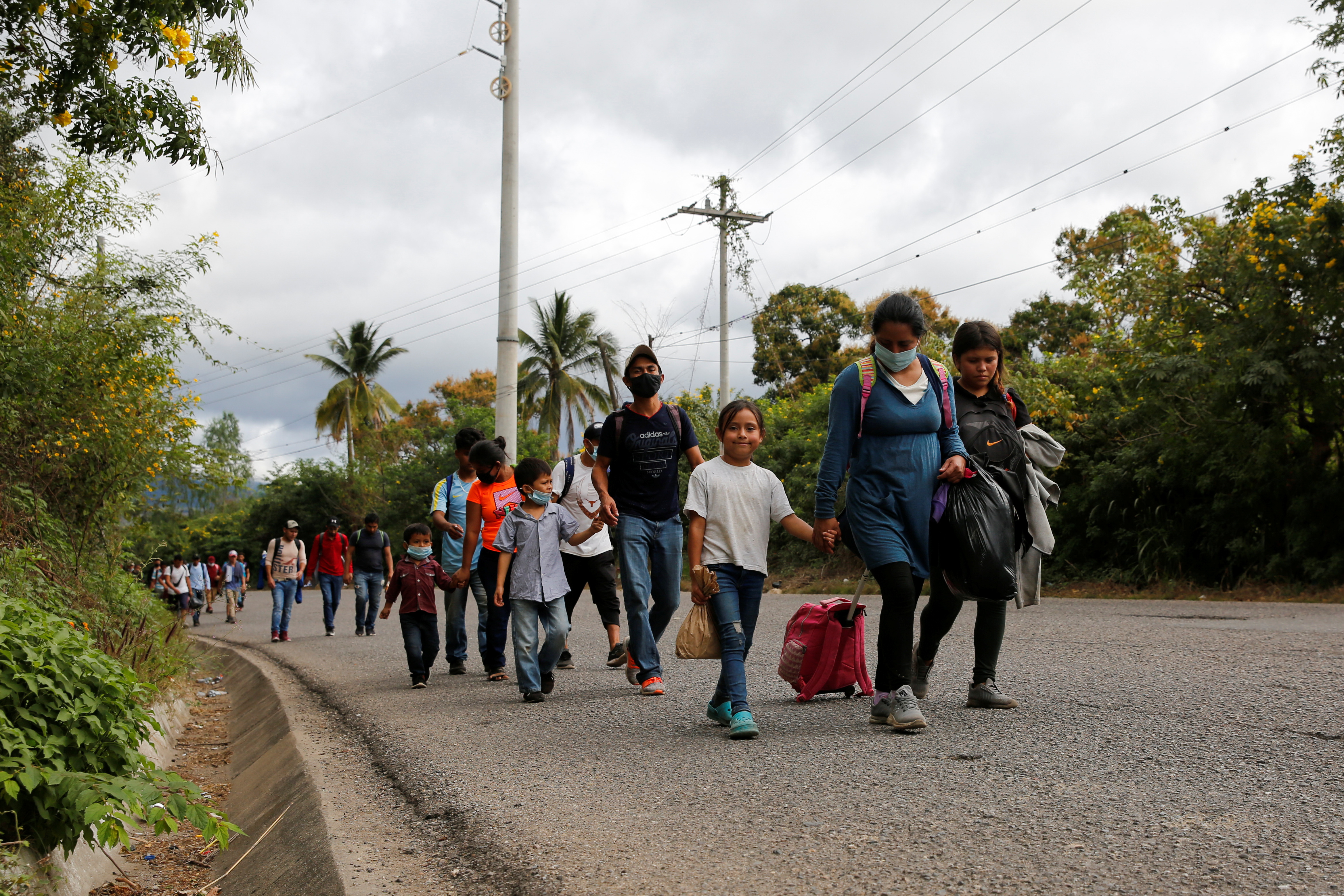 Hondurans take part in a new caravan of migrants set to head to the United States
