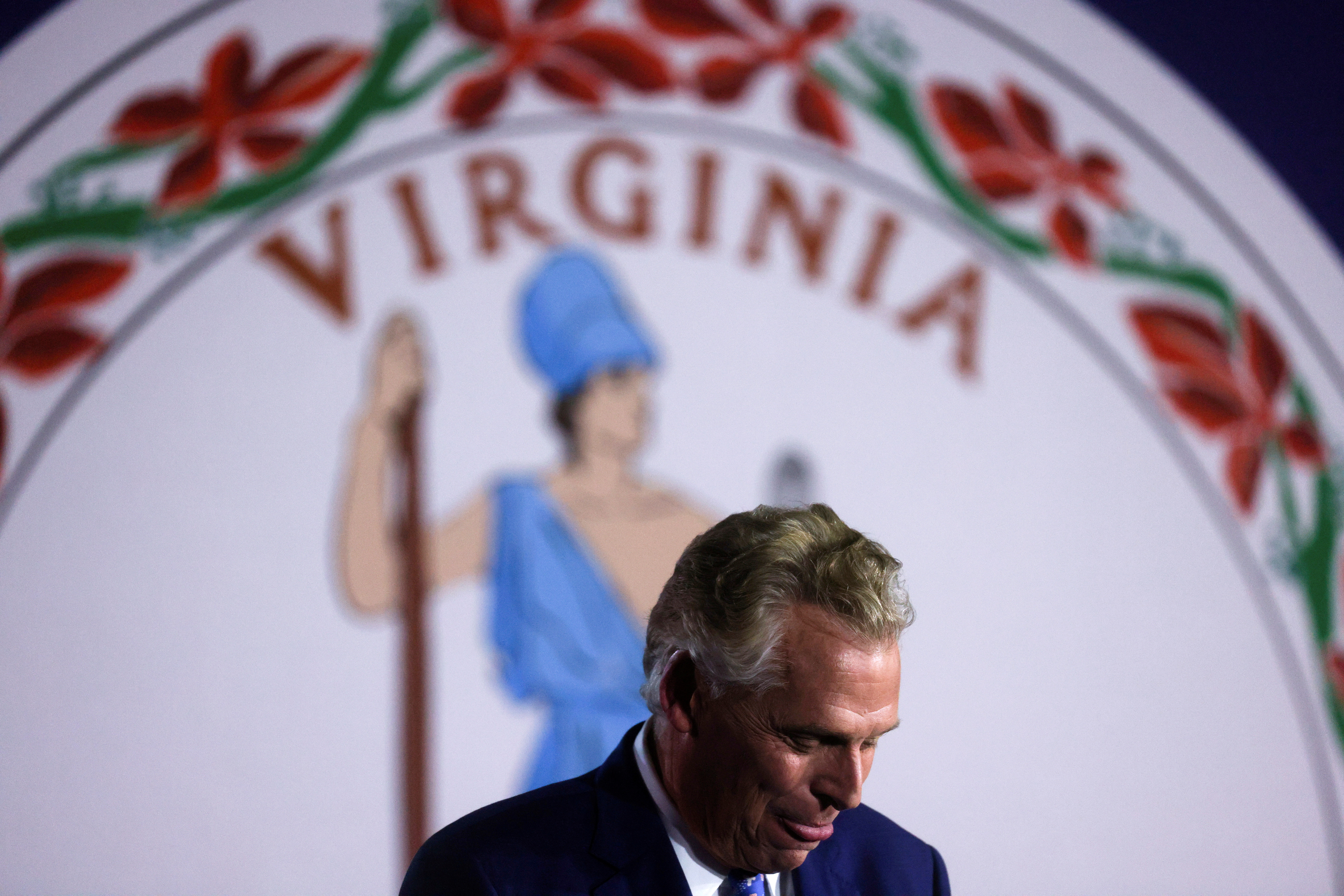 Democratic nominee for Virginia Governor Terry McAuliffe looks on as he addresses supporters during an election night party and rally in McLean, Virginia, U.S., November 2, 2021. REUTERS/Leah Millis    