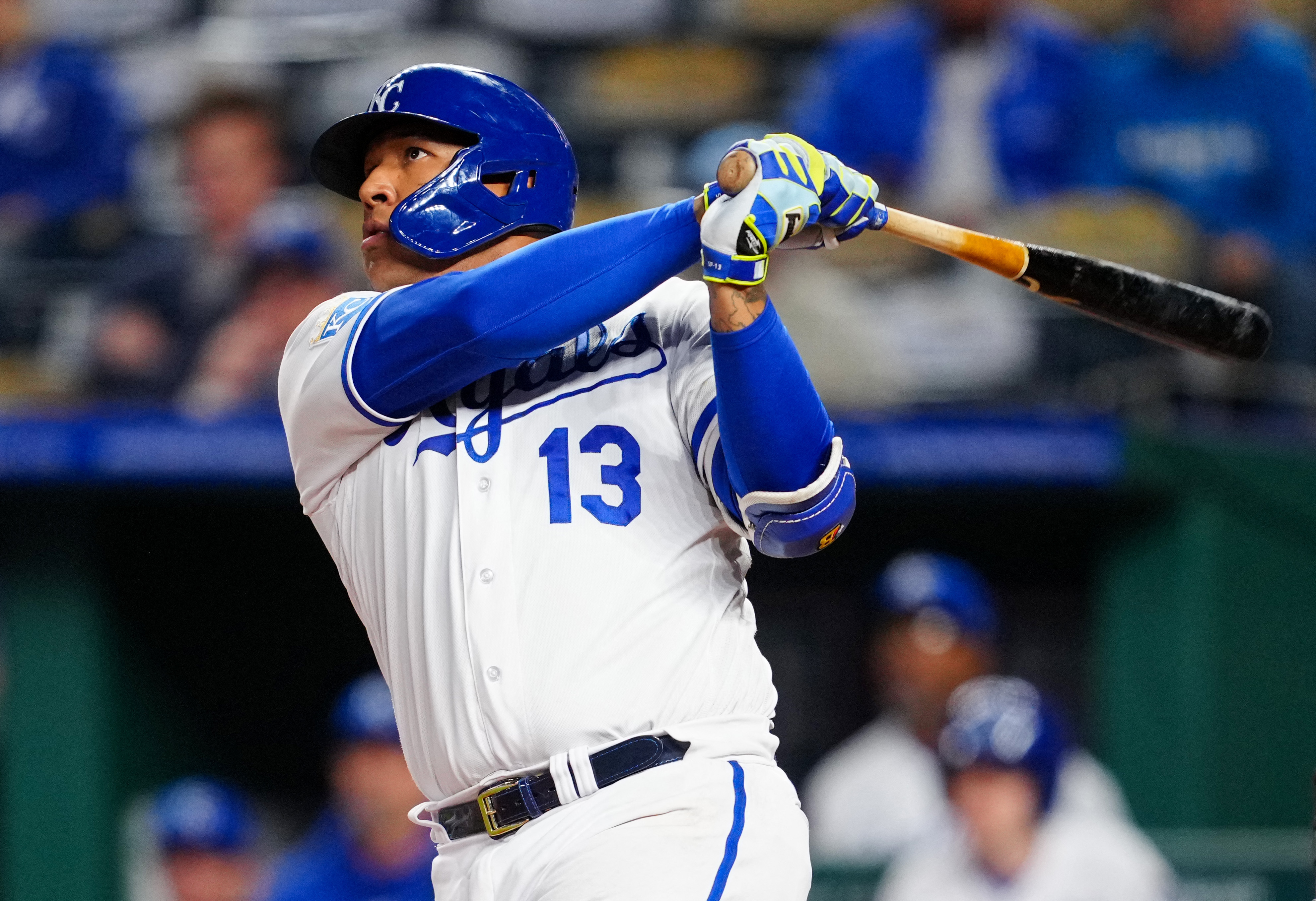 Kansas City Royals' Bobby Witt Jr. (7) celebrates with Salvador Perez (13)  after hitting a home run during the first inning of a baseball game against  the Baltimore Orioles in Kansas City