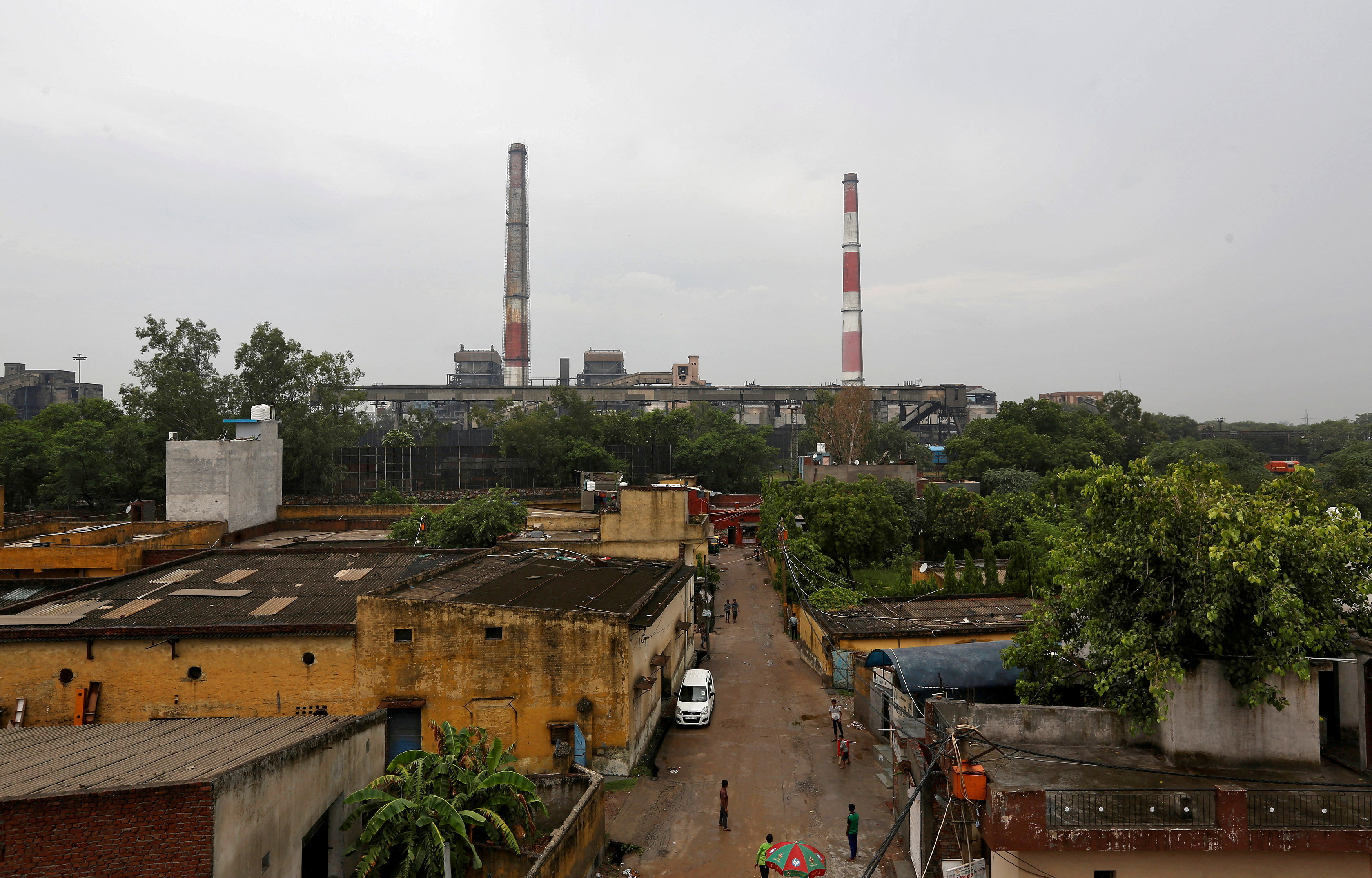 Chimneys of a coal-fired power plant are pictured in New Delhi