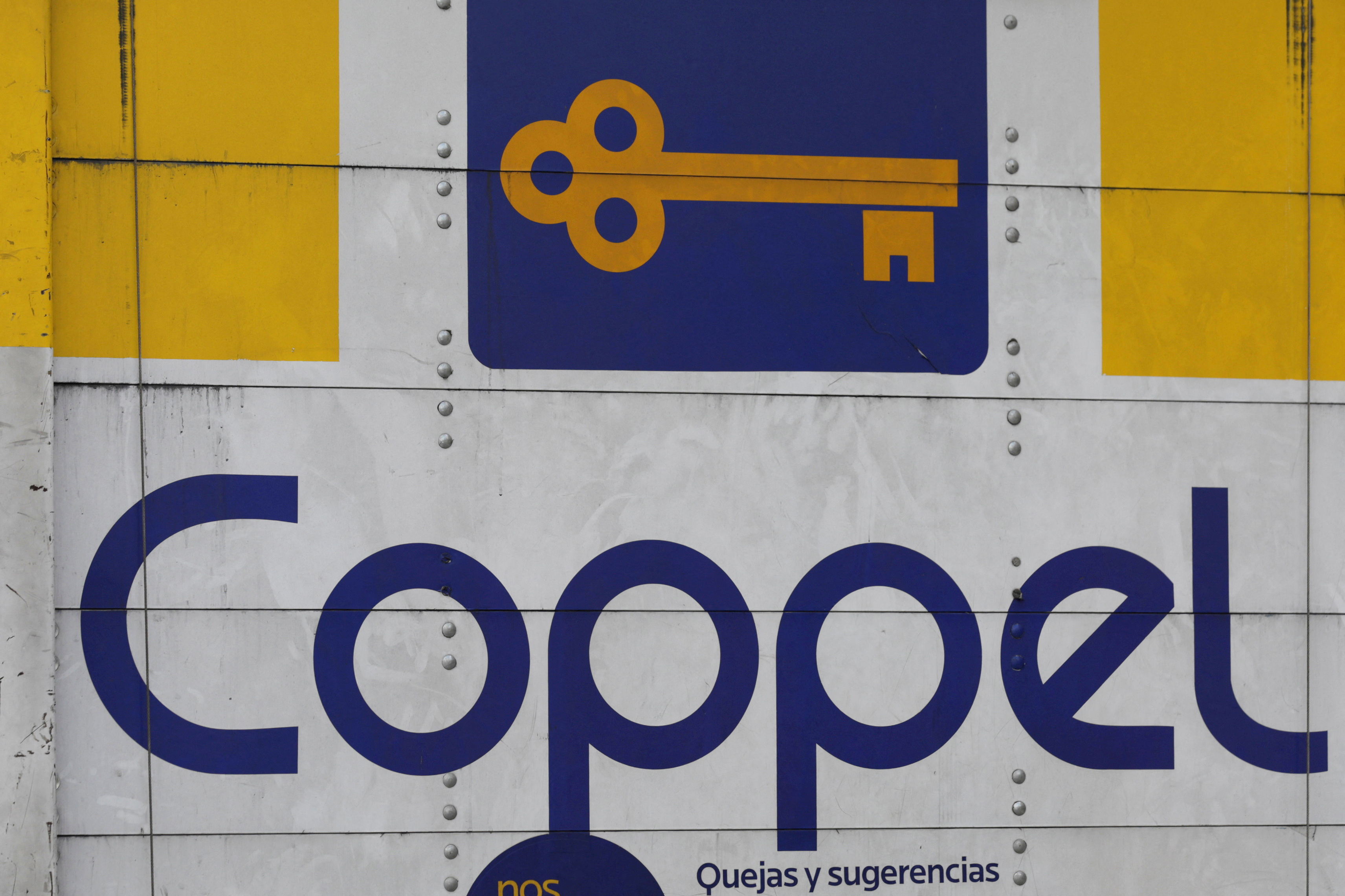 The logo of Grupo Coppel store is seen on a truck along a street in Mexico City