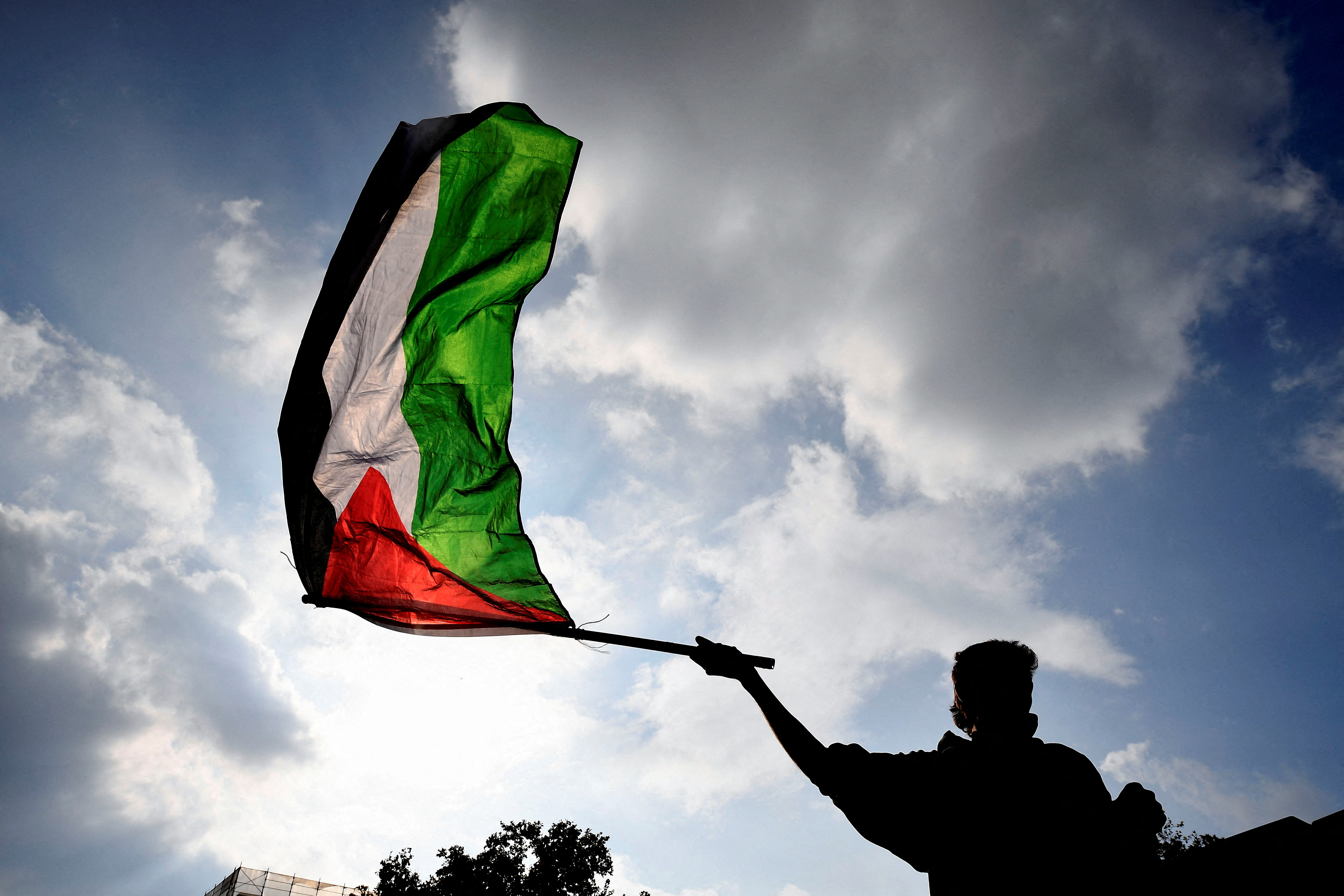 People demonstrate to express support for the Palestinians during a protest in Turin