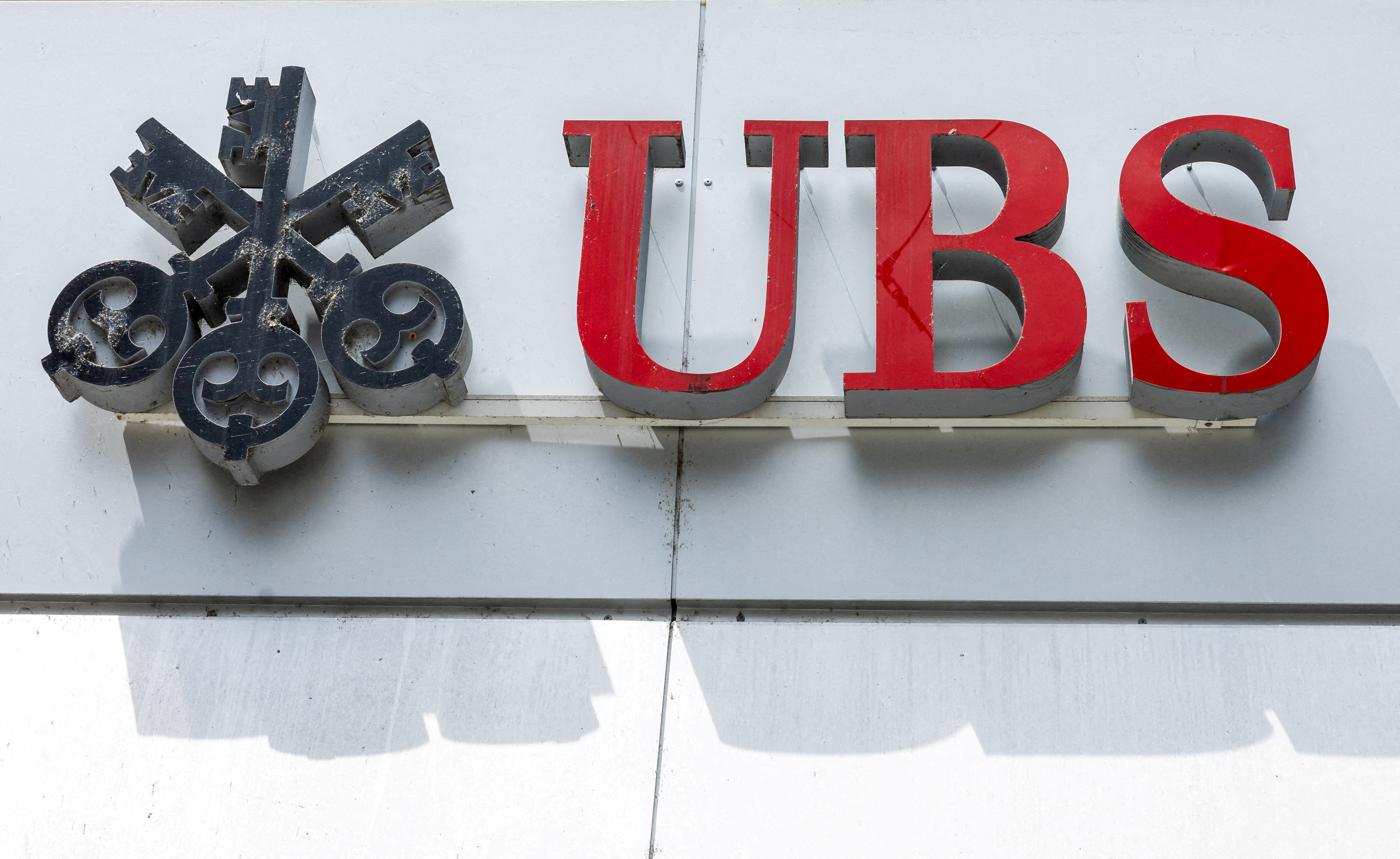 FILE PHOTO: A UBS logo is pictured on the branch of the Swiss bank in Lucerne