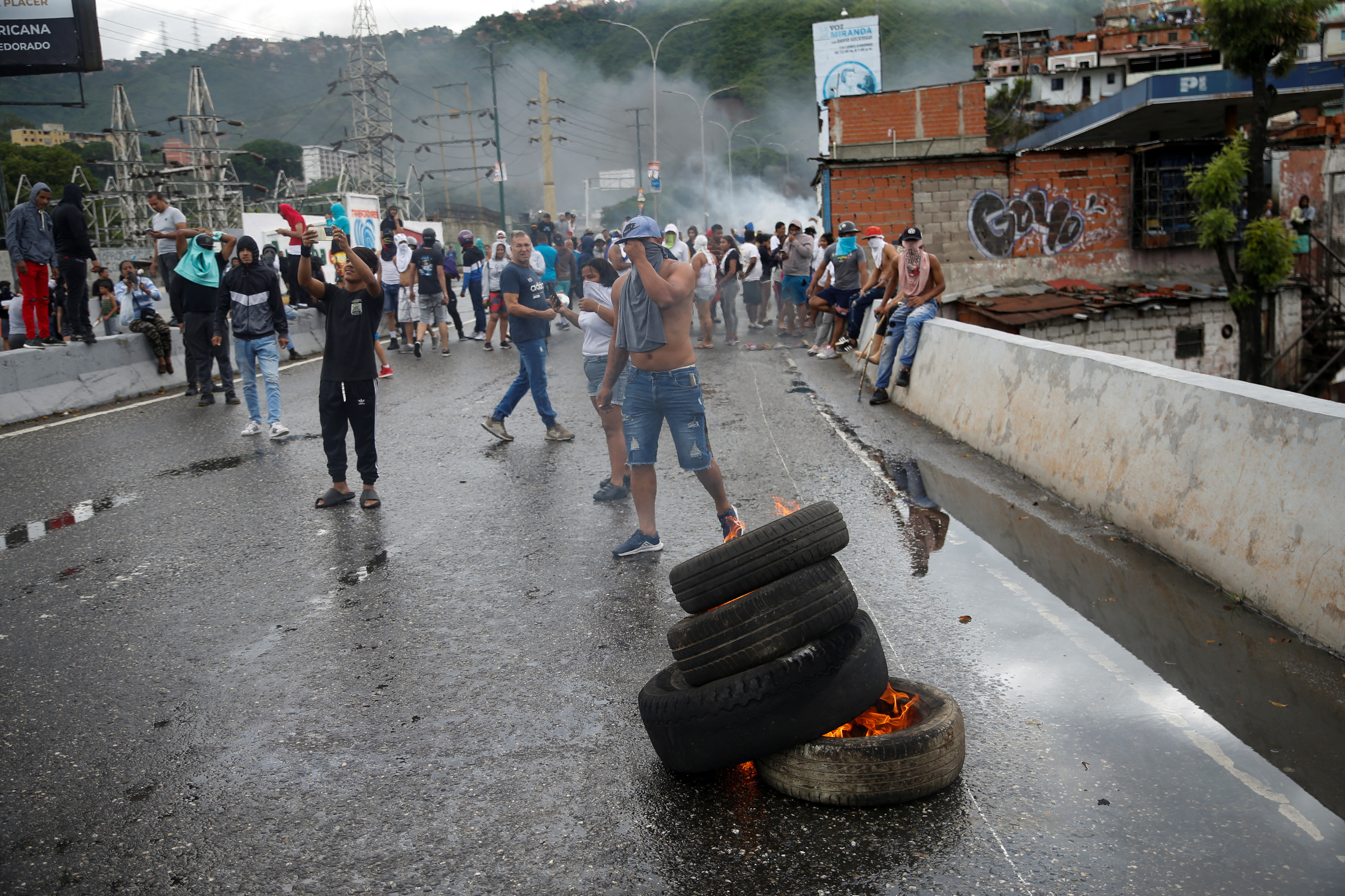 Supporters of Venezuelan opposition demonstrate following the announcement Venezuela's President Maduro won the presidential election, in Caracas