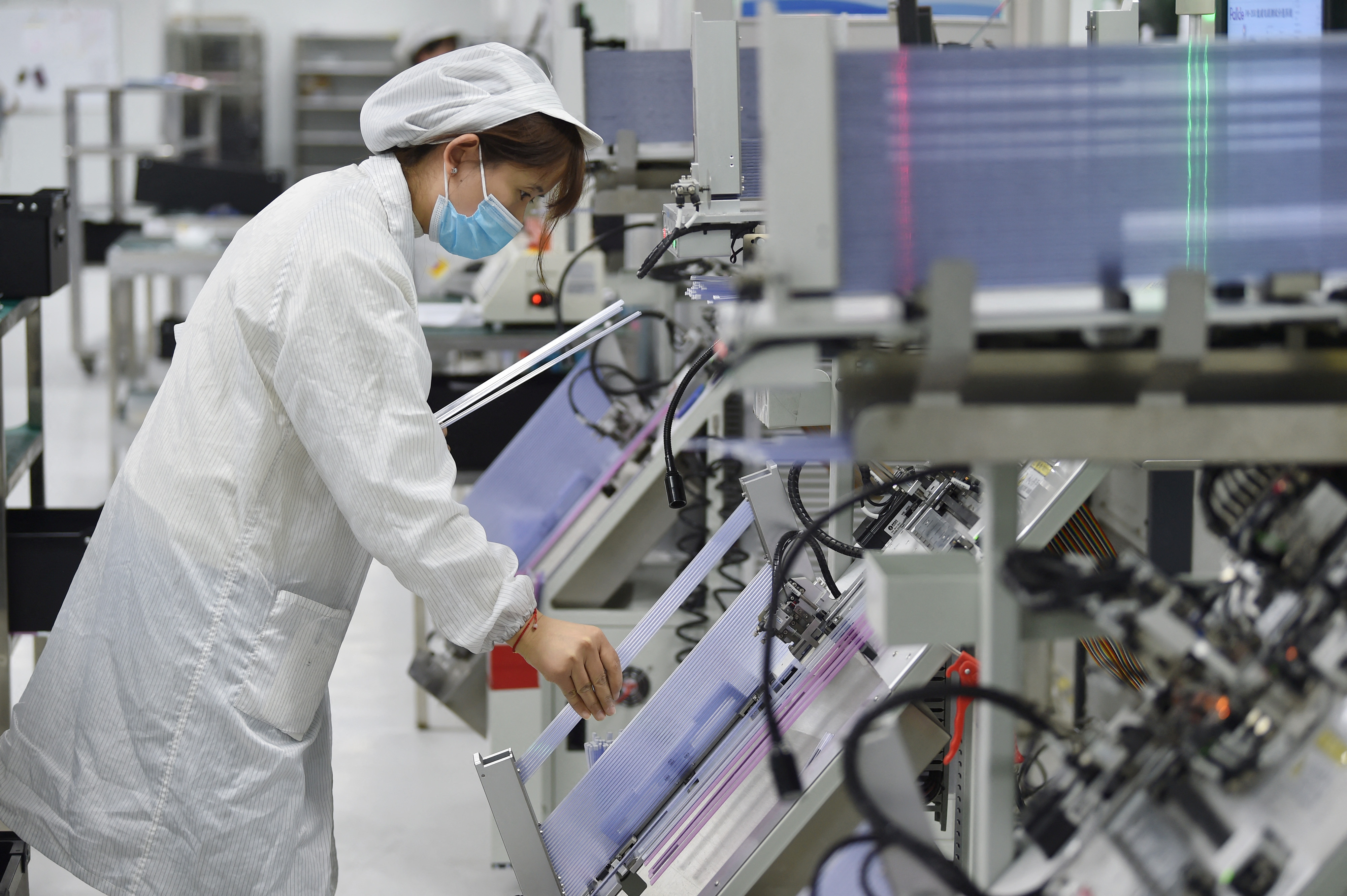 China's new five-year plan calls for AI throughout its economy, tech breakthroughs
