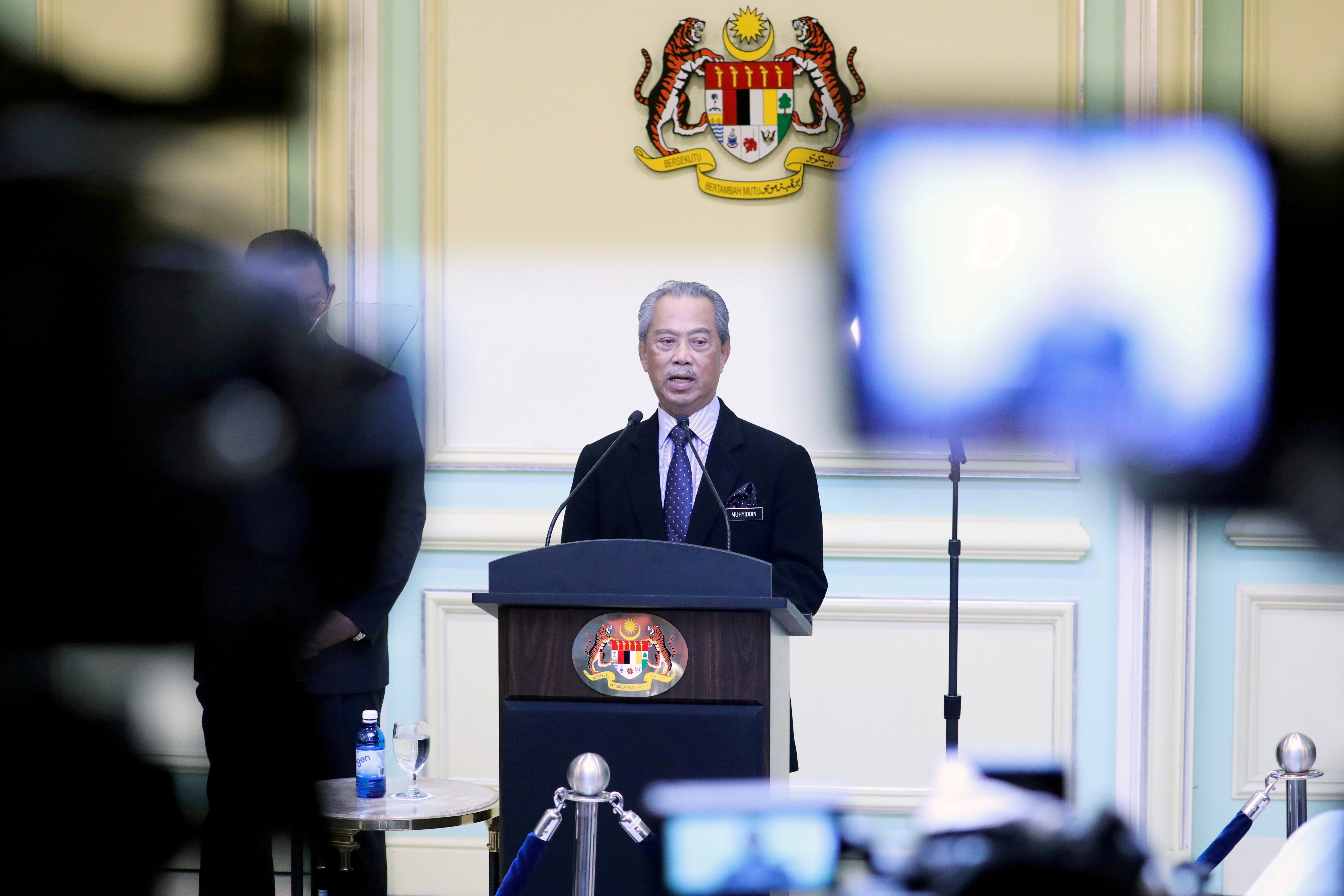 FILE PHOTO: Malaysia's Prime Minister Muhyiddin Yassin speaking during his cabinet announcement in Putrajaya