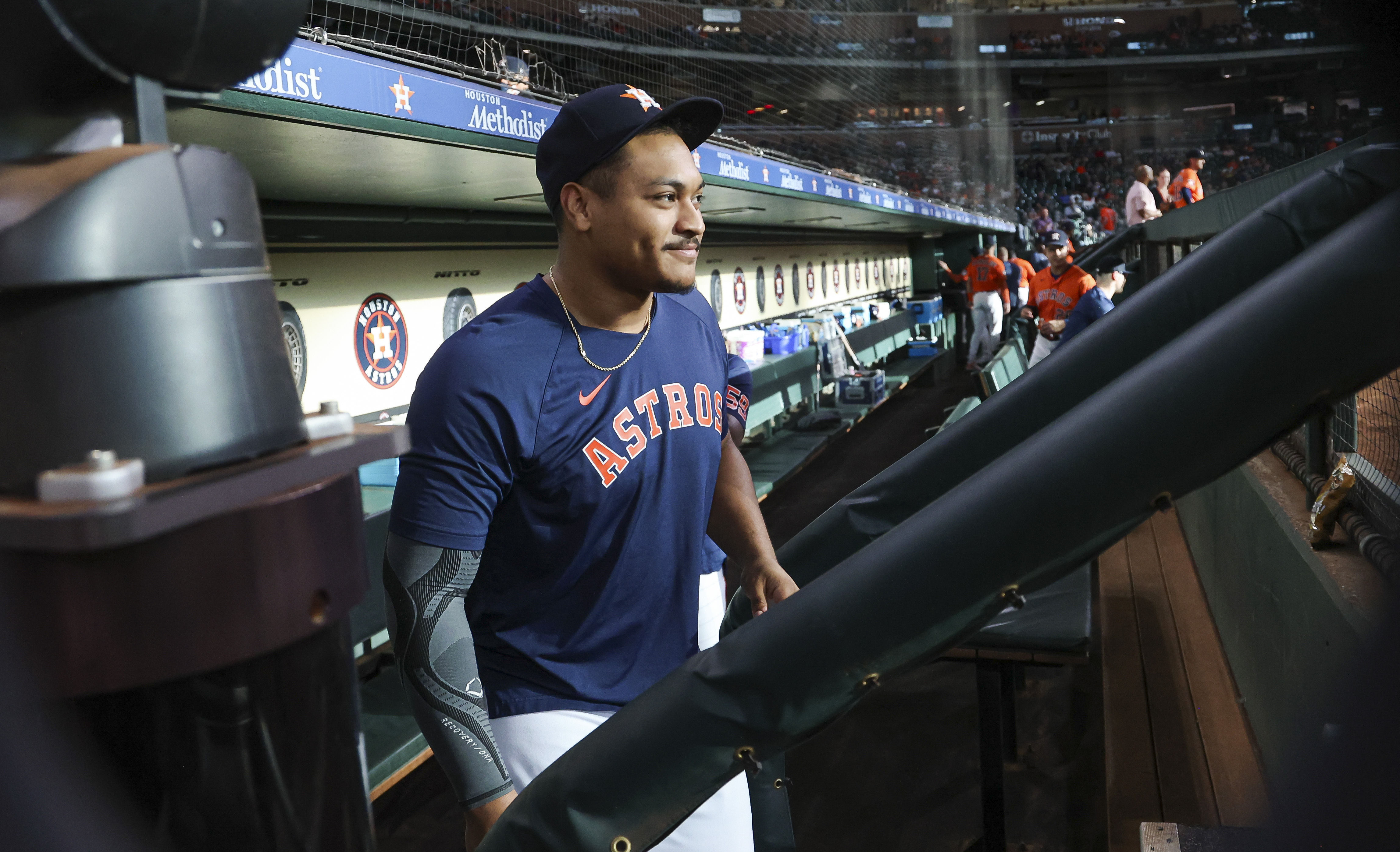 Houston Astros' Mauricio Dubon smiles during batting practice