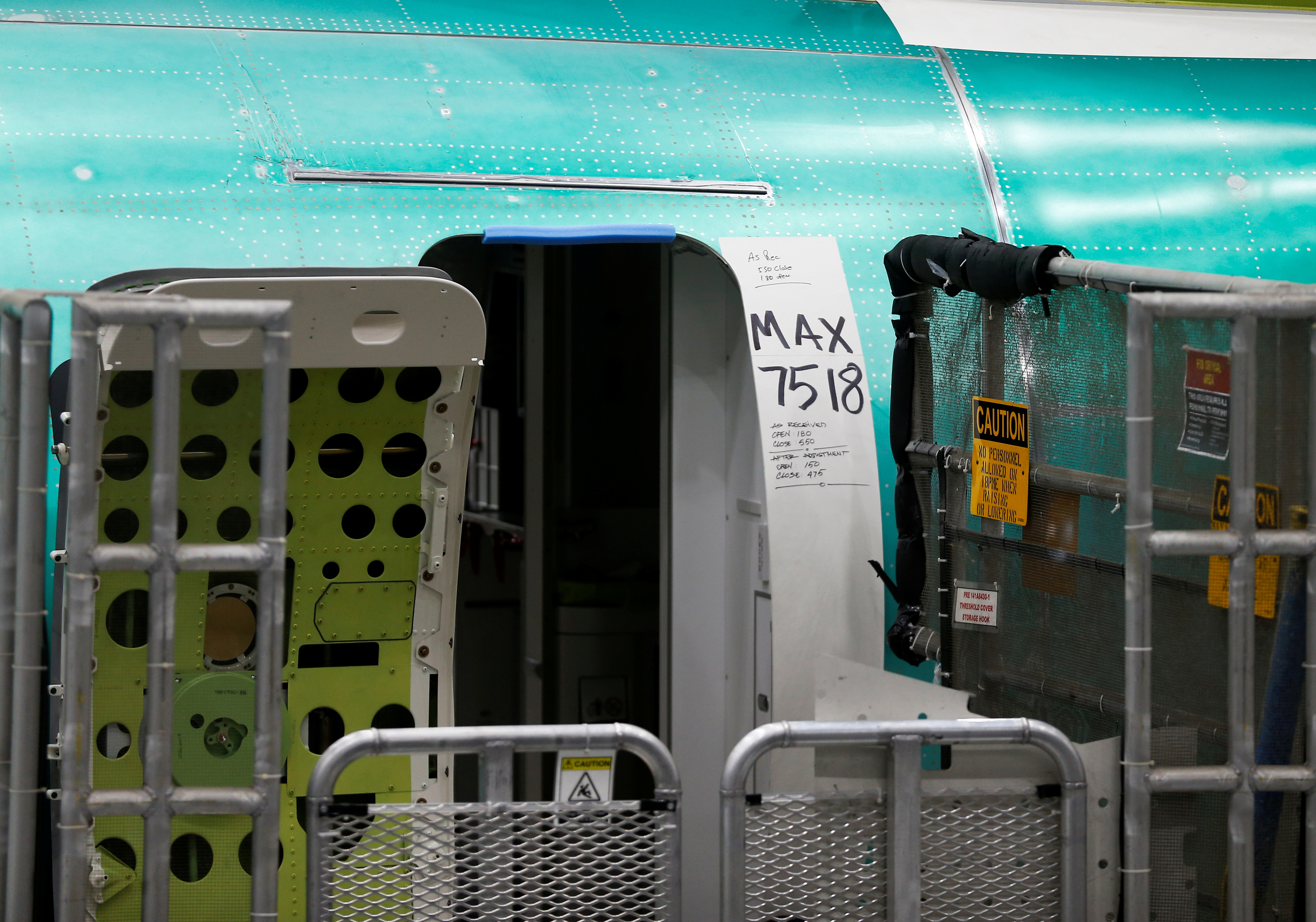 A door of a 737 Max aircraft with production notes is seen at the Boeing factory in Renton