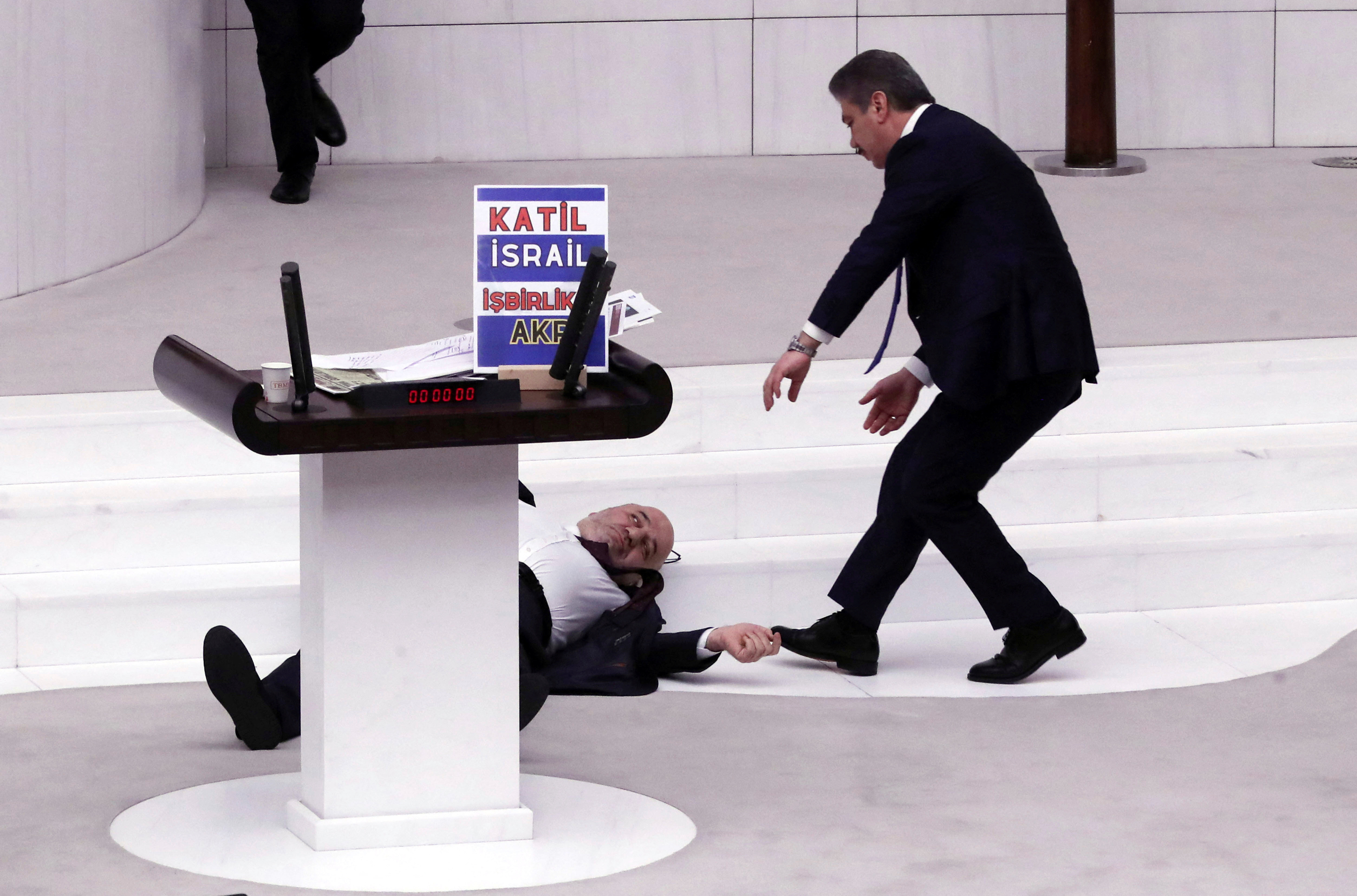 Turkey's Saadet lawmaker Hasan Bitmez collapses at the parliament in Ankara