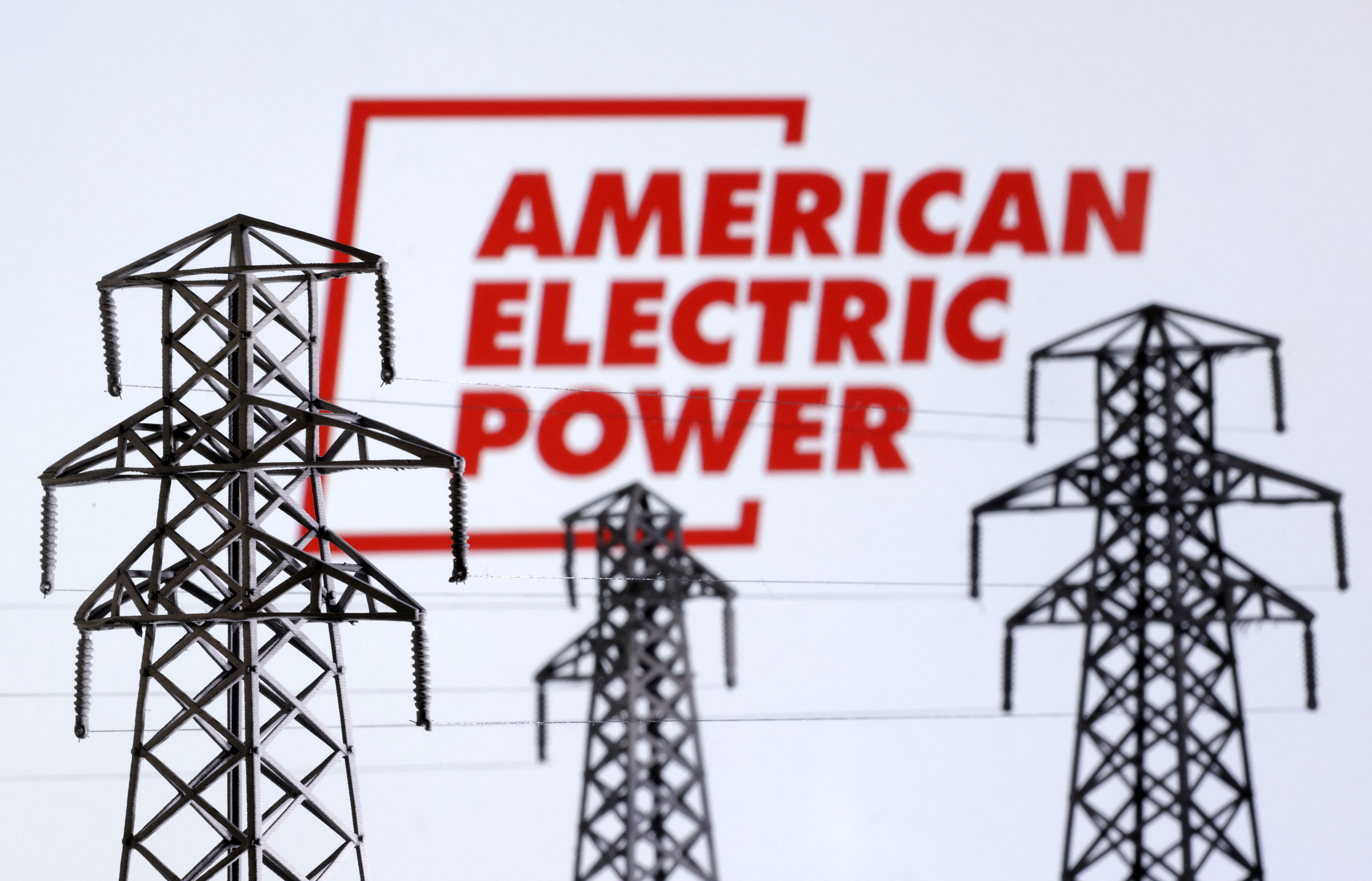 Illustration shows Electric power transmission pylon miniatures and American Electric Power logo