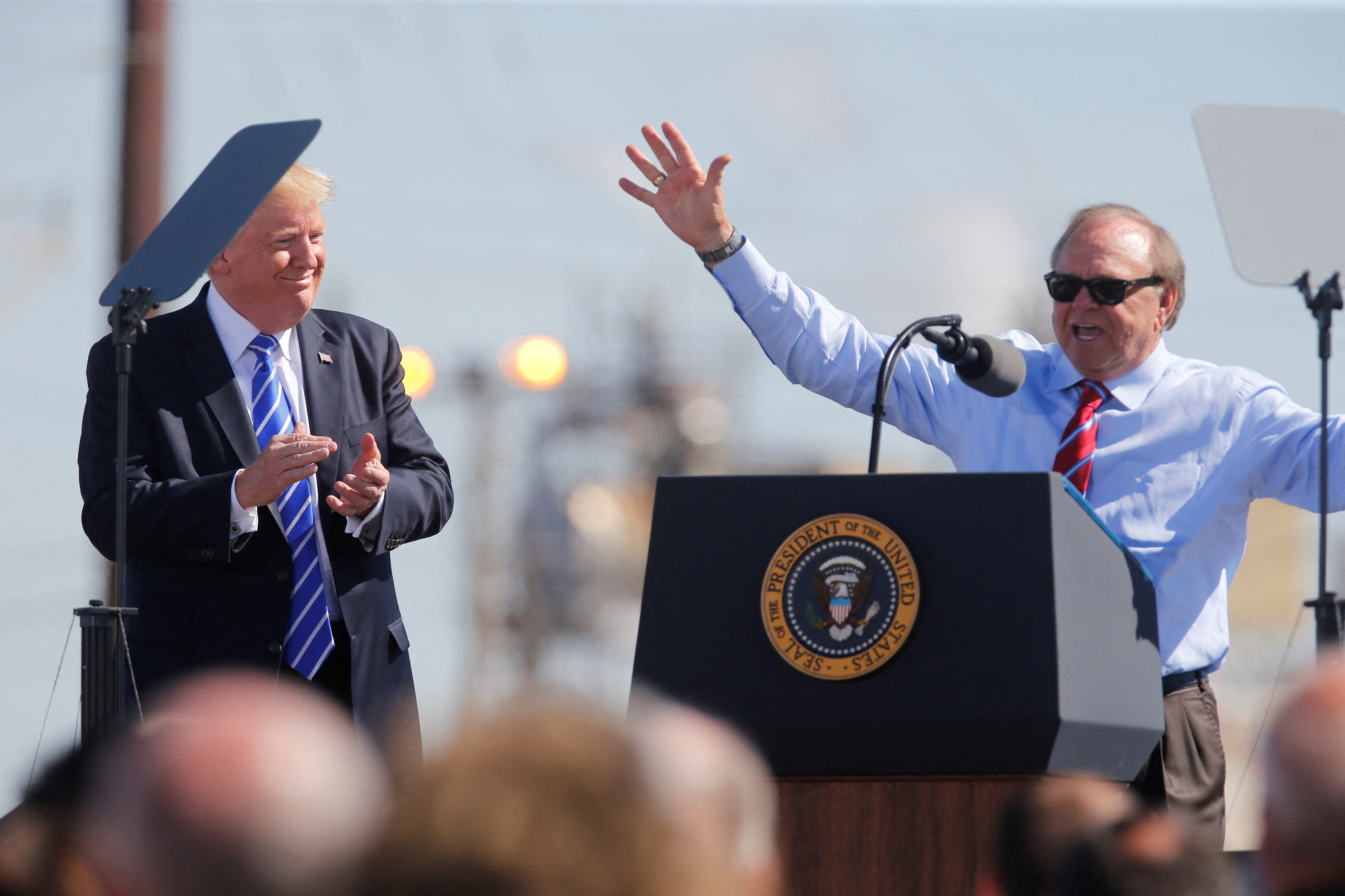 U.S. President Trump applauds CEO Hamm during  tax reform event at Andeavor Refinery in Mandan, North Dakota    in Manden, North Dakota