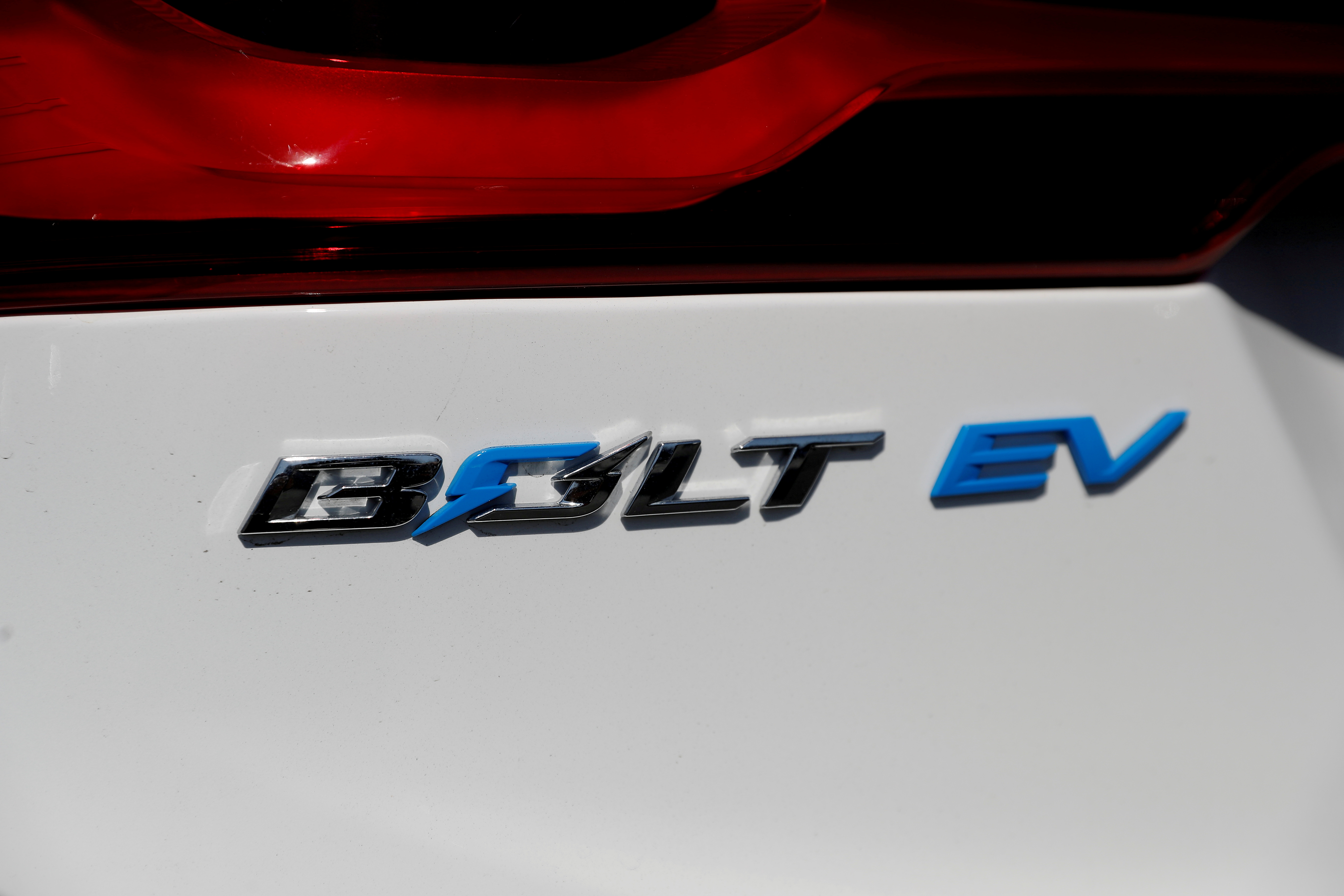 A close-up view of the Chevrolet Bolt electric vehicle logo is seen at Stewart Chevrolet in Colma, California