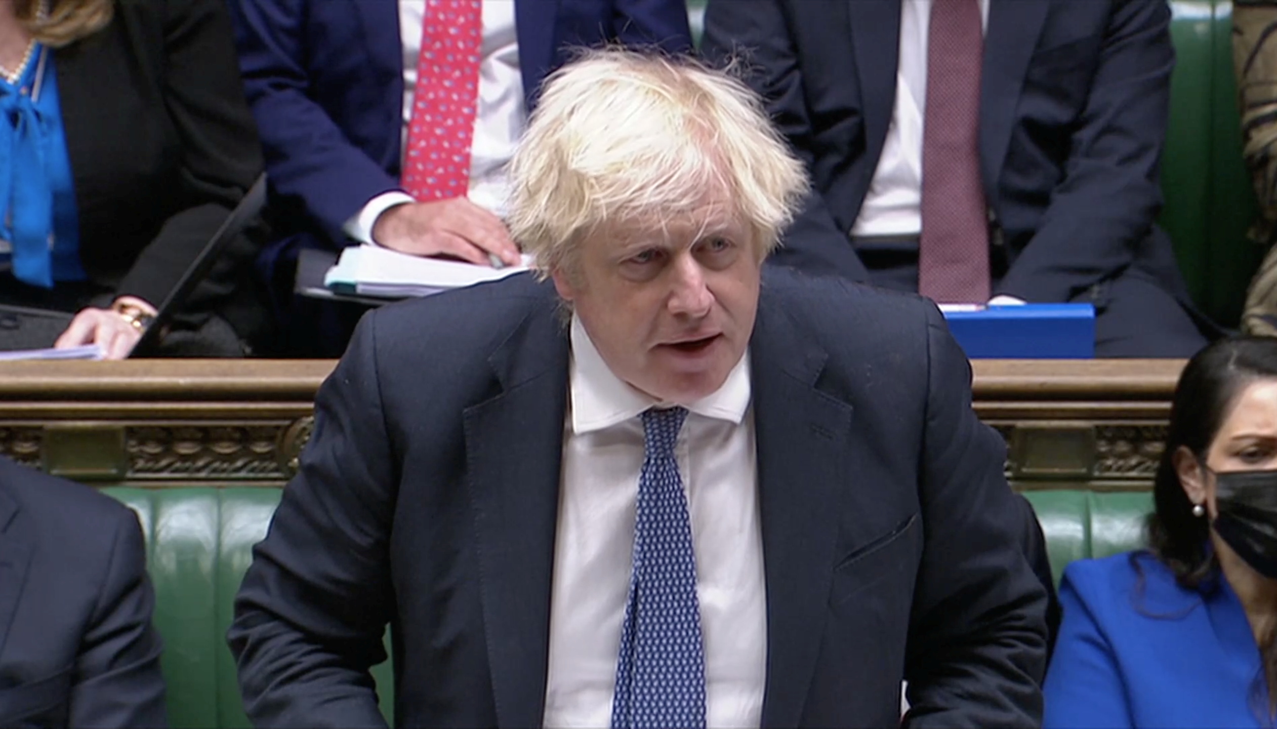 Britain's Prime Minister Boris Johnson speaks during the weekly question time debate at Parliament in London, Britain, December 8, 2021, in this screen grab taken from video. Reuters TV via REUTERS THIS IMAGE HAS BEEN SUPPLIED BY A THIRD PARTY. NEWS AND CURRENT AFFAIRS USE ONLY, CANNOT BE USED FOR LIGHT ENTERTAINMENT OR SATIRICAL PURPOSES, PARTY POLITICAL BROADCAST USAGE MUST BE CLEARED WITH PBU