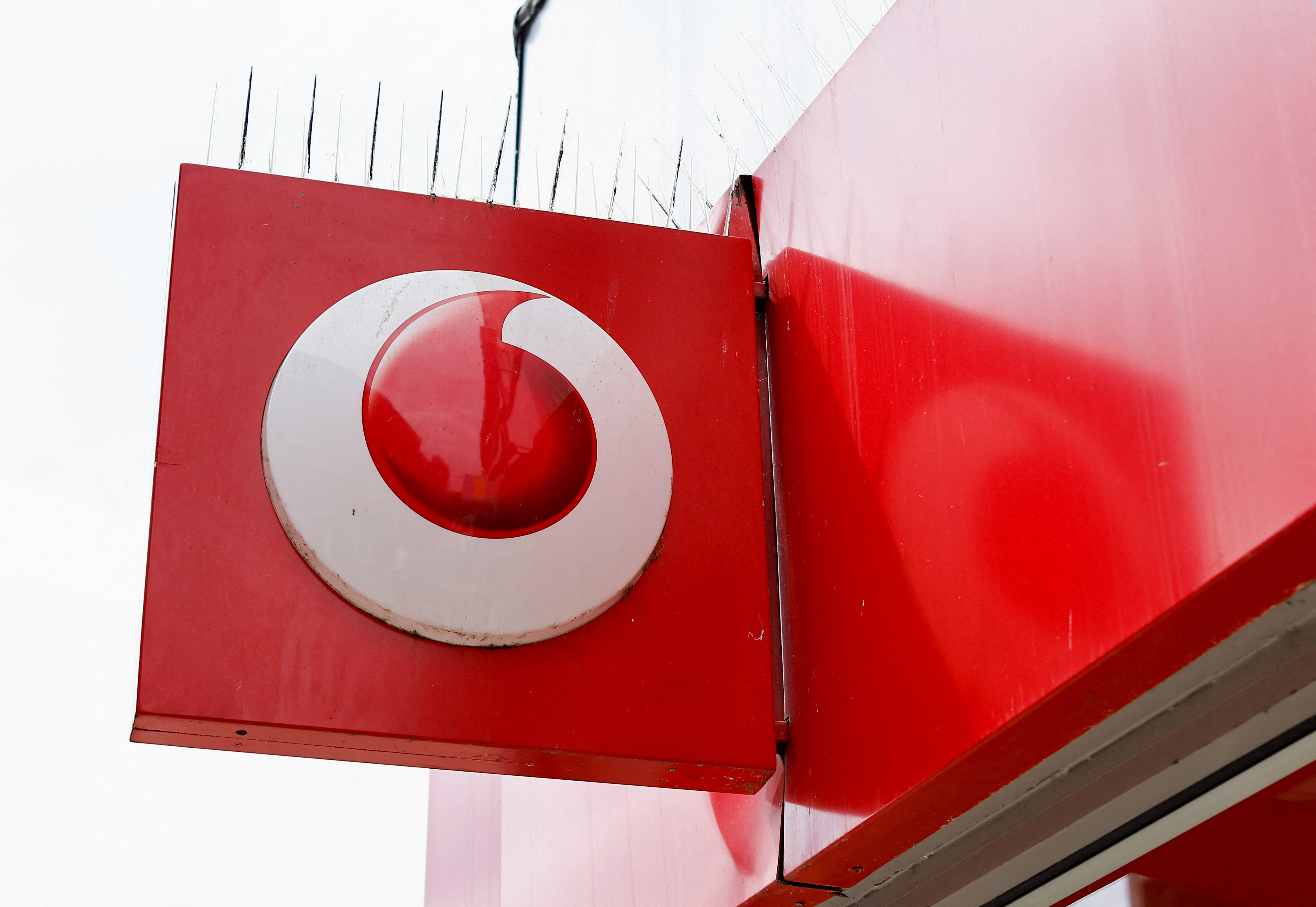 The logo of Vodafone is seen at a Vodafone store in Northwich