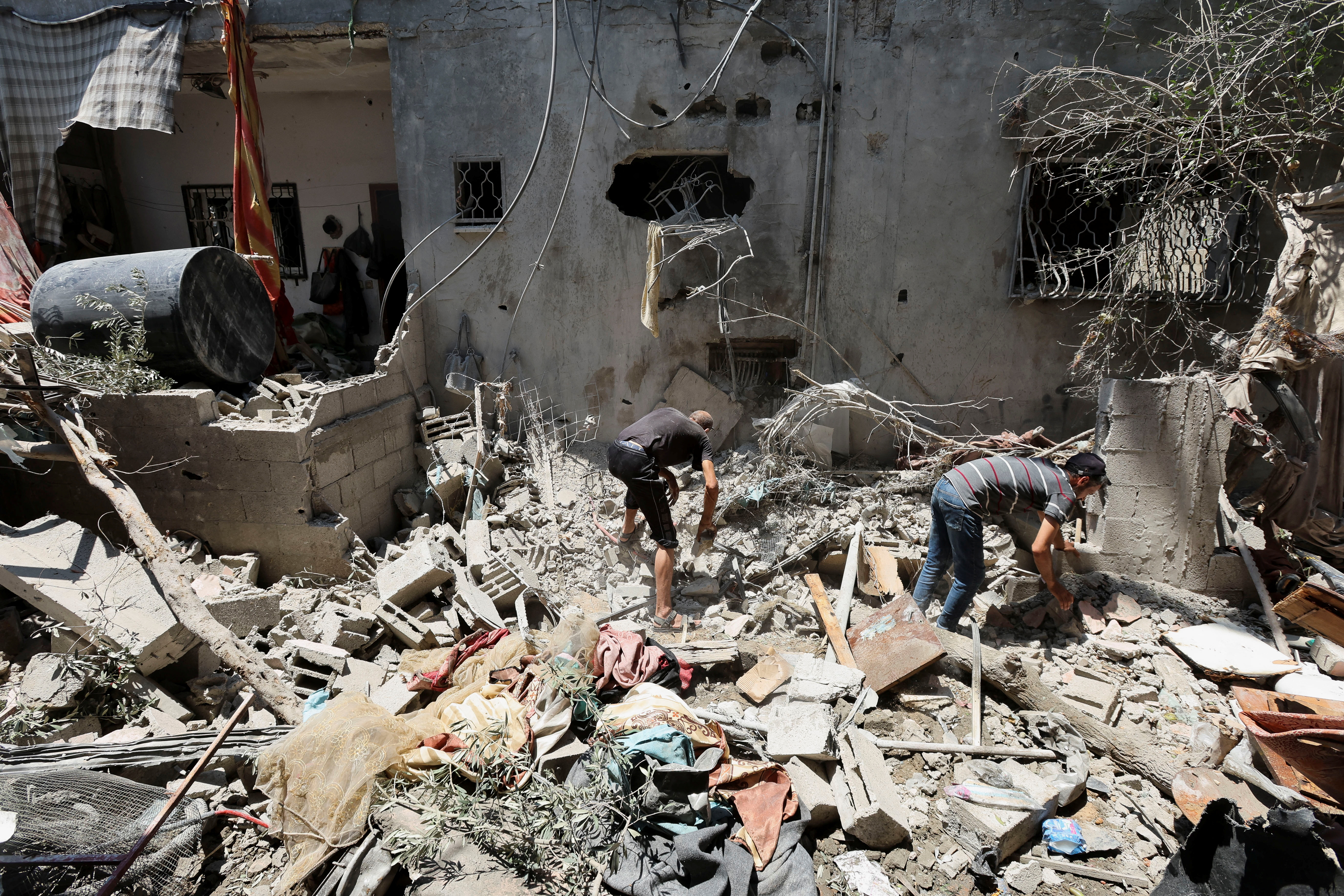 Israel launches new Gaza strikes after weekend attack kills scores in safe zone | Reuters
