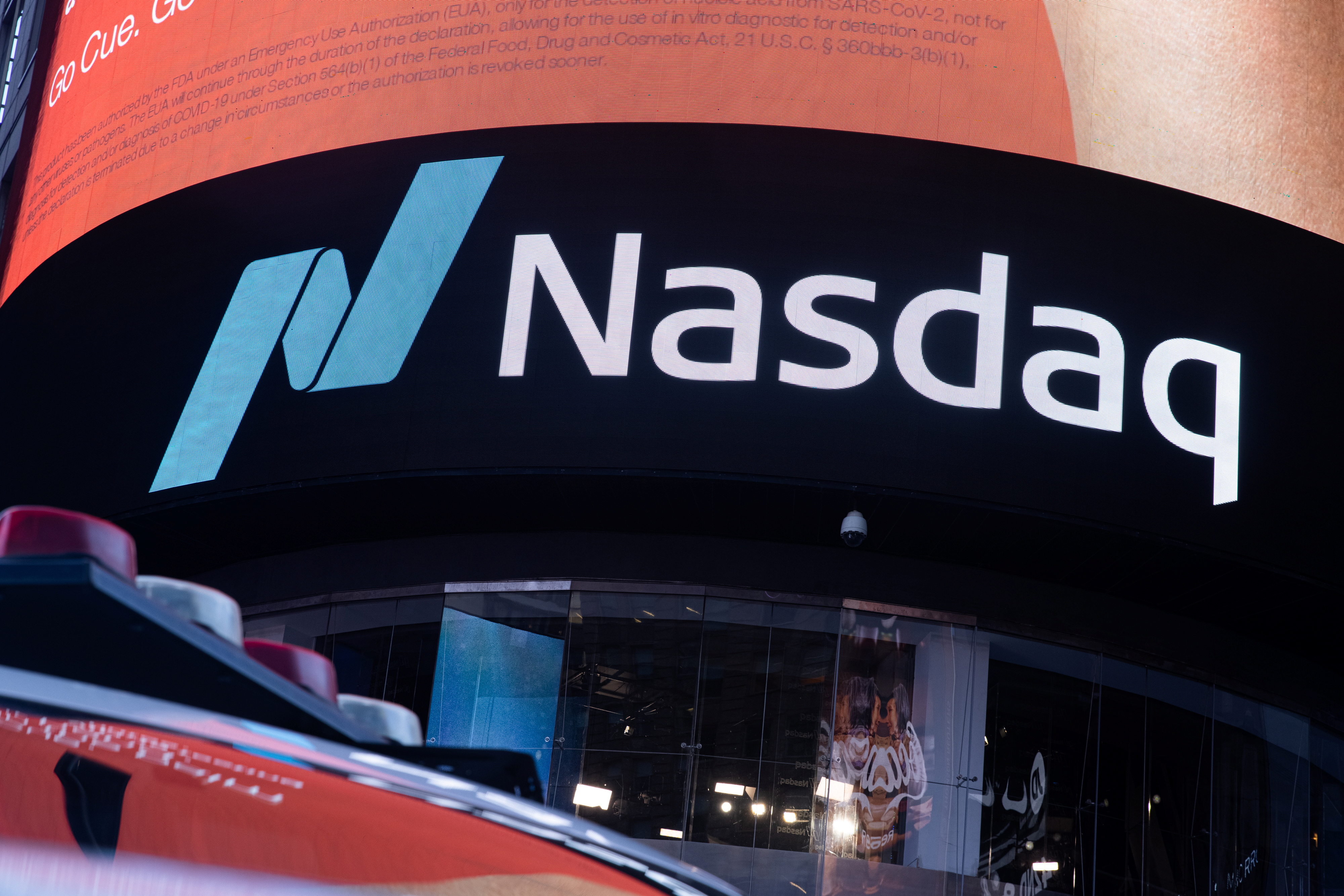 The Nasdaq logo is displayed at the Nasdaq Market site in Times Square in New York City, December 3, 2021. REUTERS/Jeenah Moon