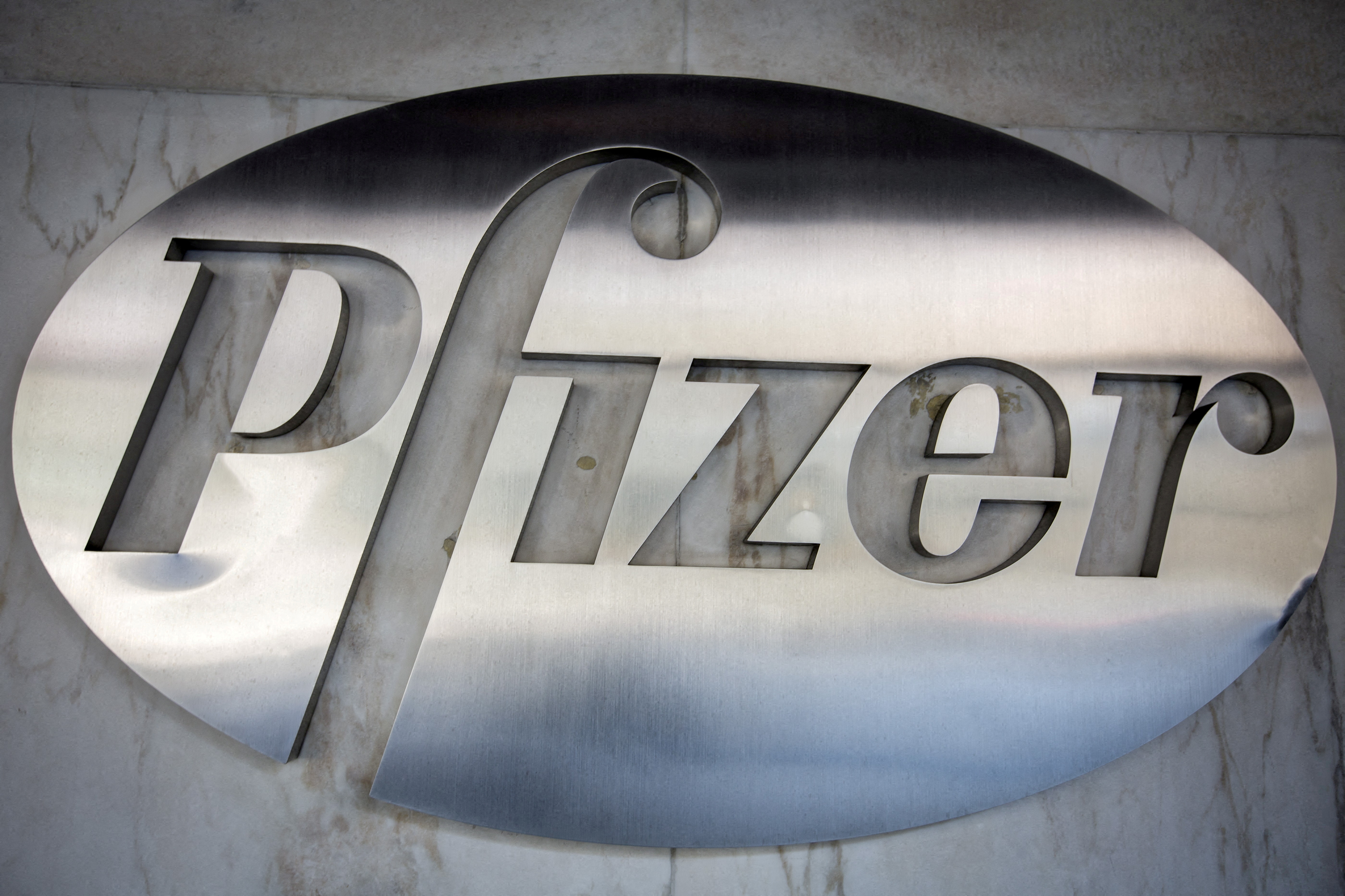 FILE PHOTO: The Pfizer logo is pictured at their building in the Manhattan borough of New York