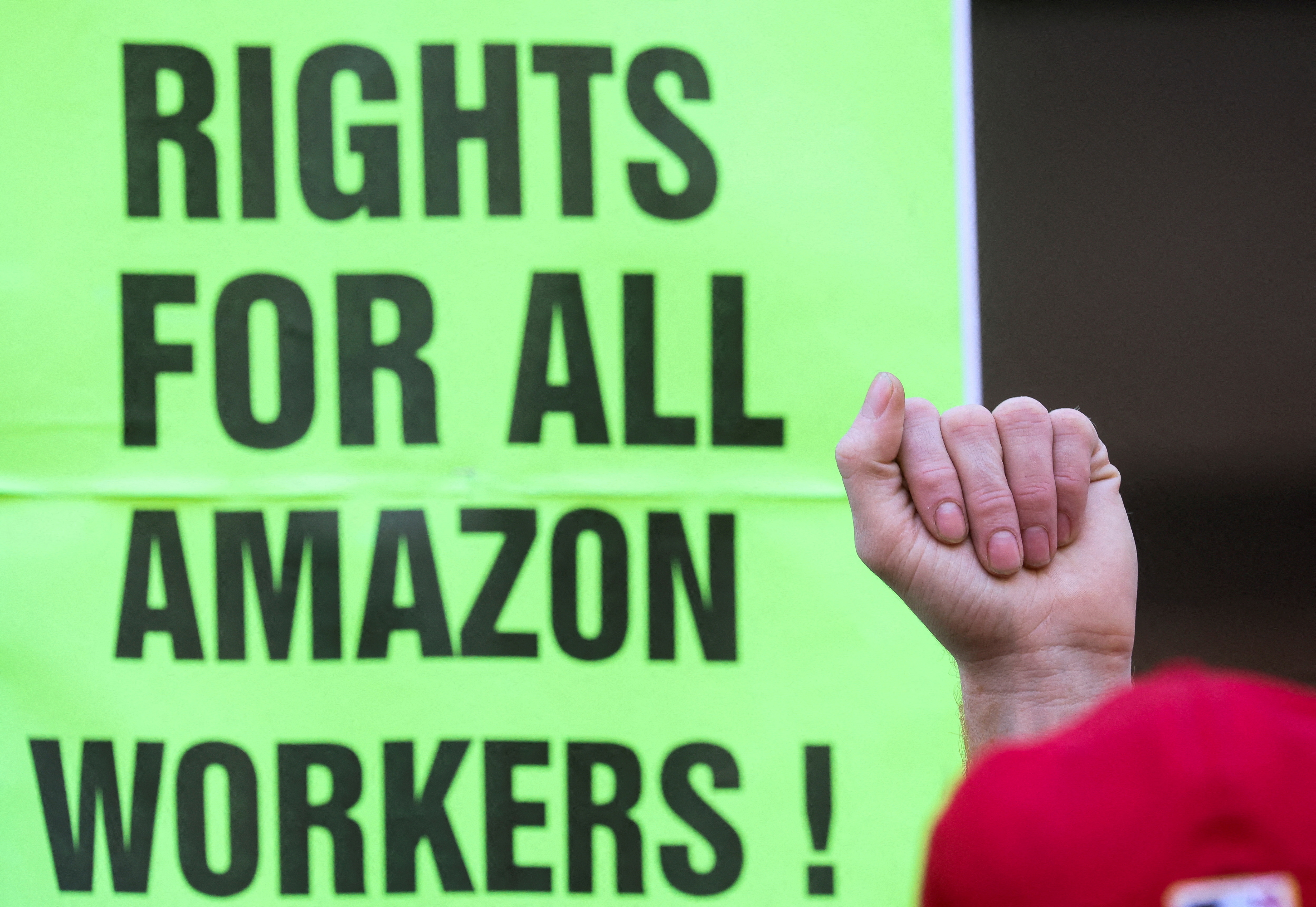 Amazon.com Inc workers react to the outcome of the vote to unionize, in Brooklyn