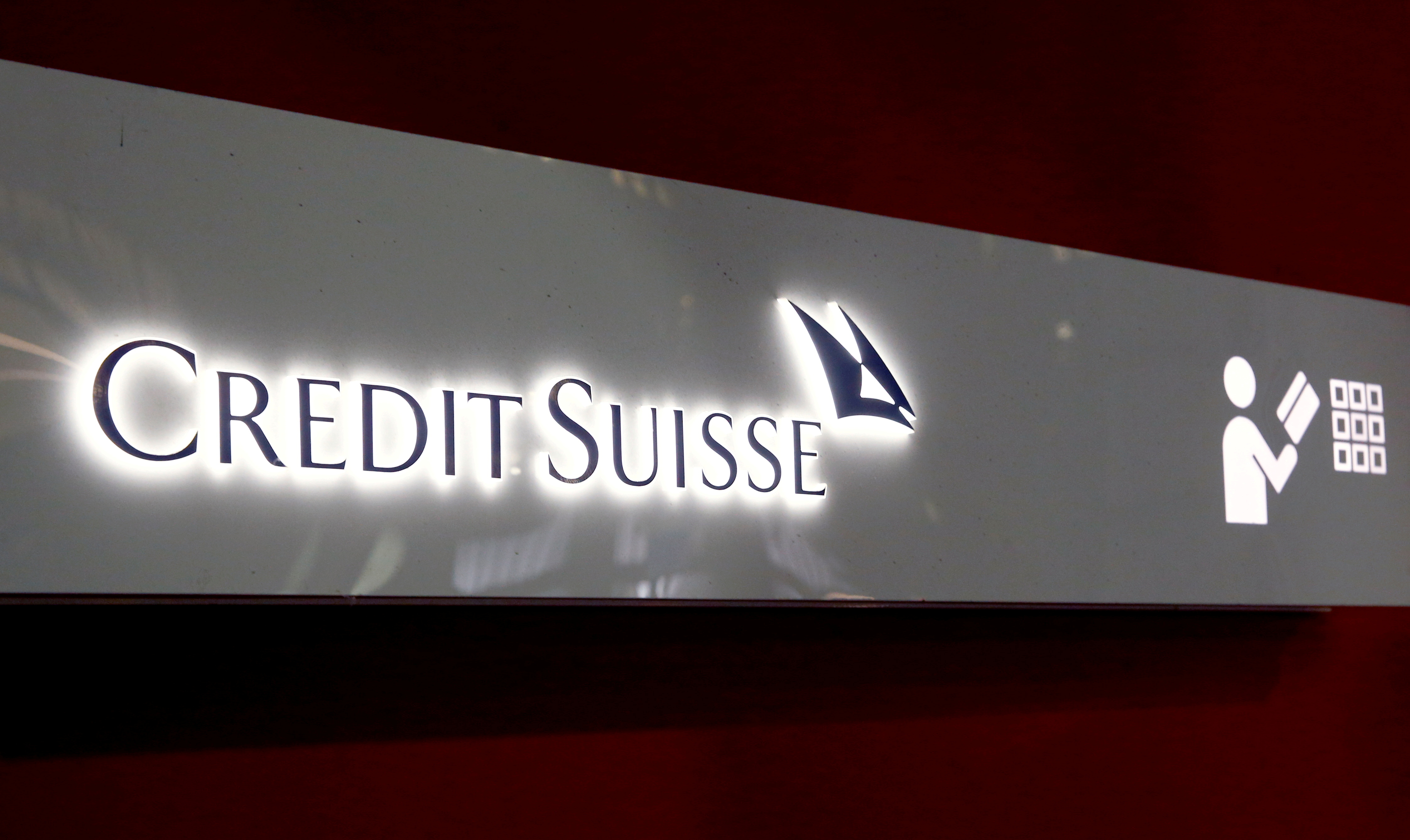 The logo of Swiss bank Credit Suisse is seen at a branch office in Zurich, Switzerland, November 3, 2021. REUTERS/Arnd WIegmann/File Photo