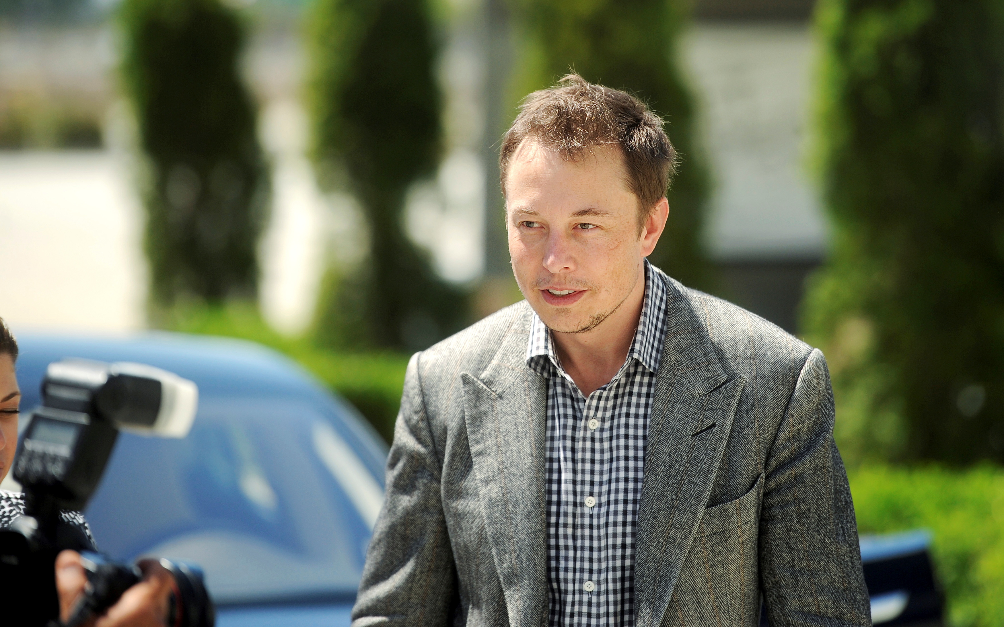 Tesla Chief Executive Officer Elon Musk leaves a press event at his company's factory in Fremont