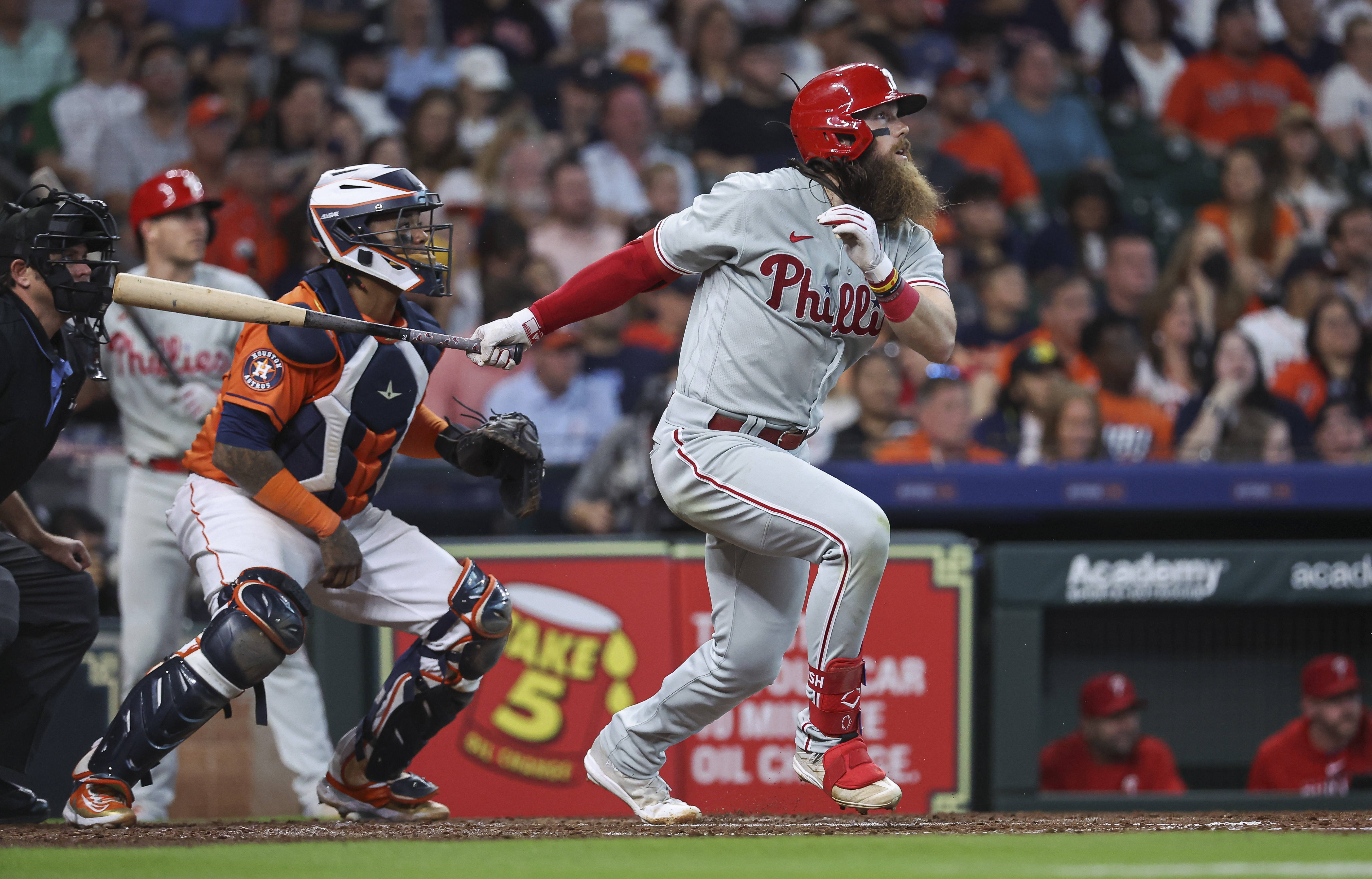 Astros squeak past Phils, claim one game in series