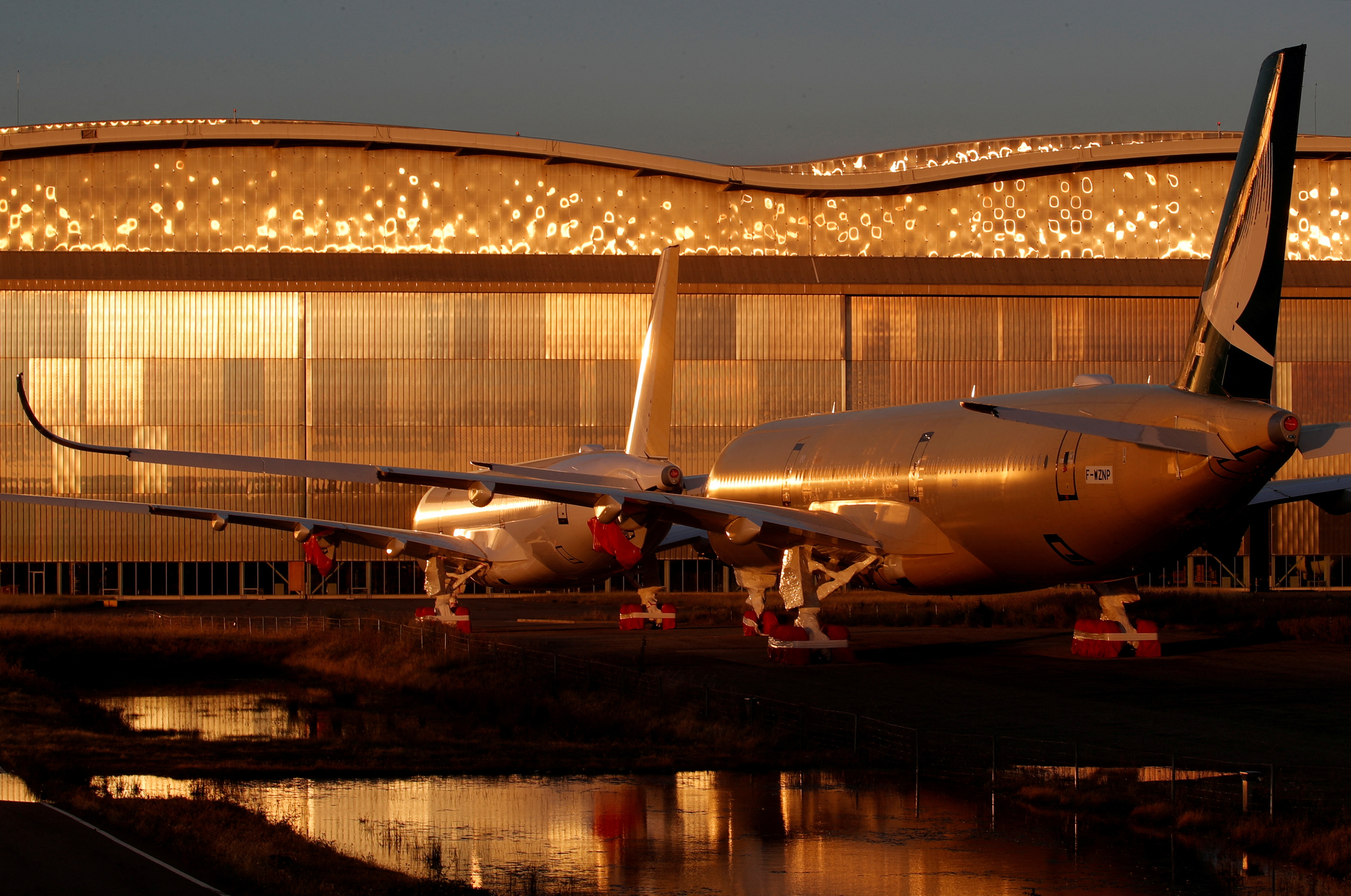 A350 passenger aircraft are seen parked at the Airbus factory in Blagnac near Toulouse
