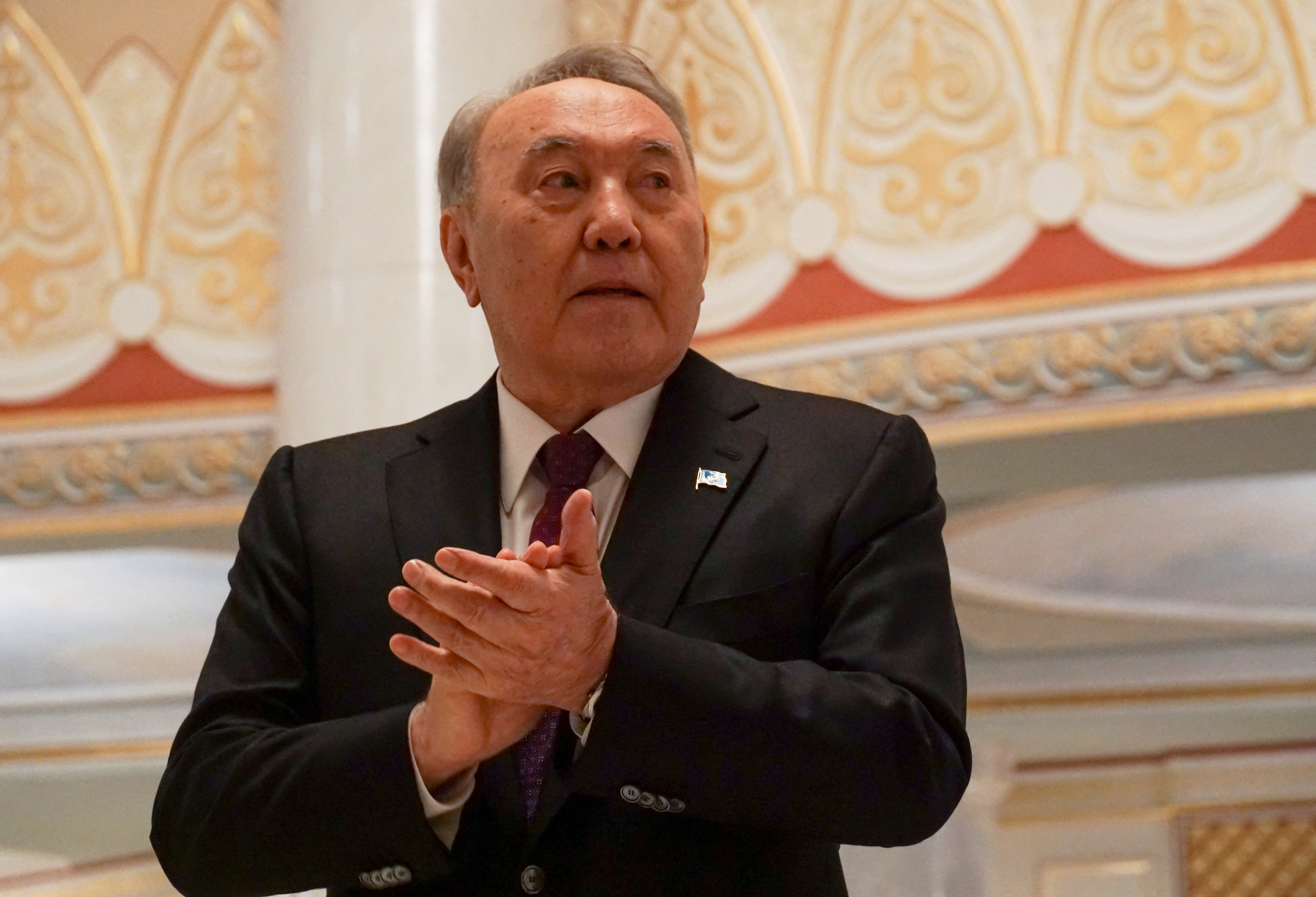 Kazakh former President Nursultan Nazarbayev votes during parliamentary election, in Astana