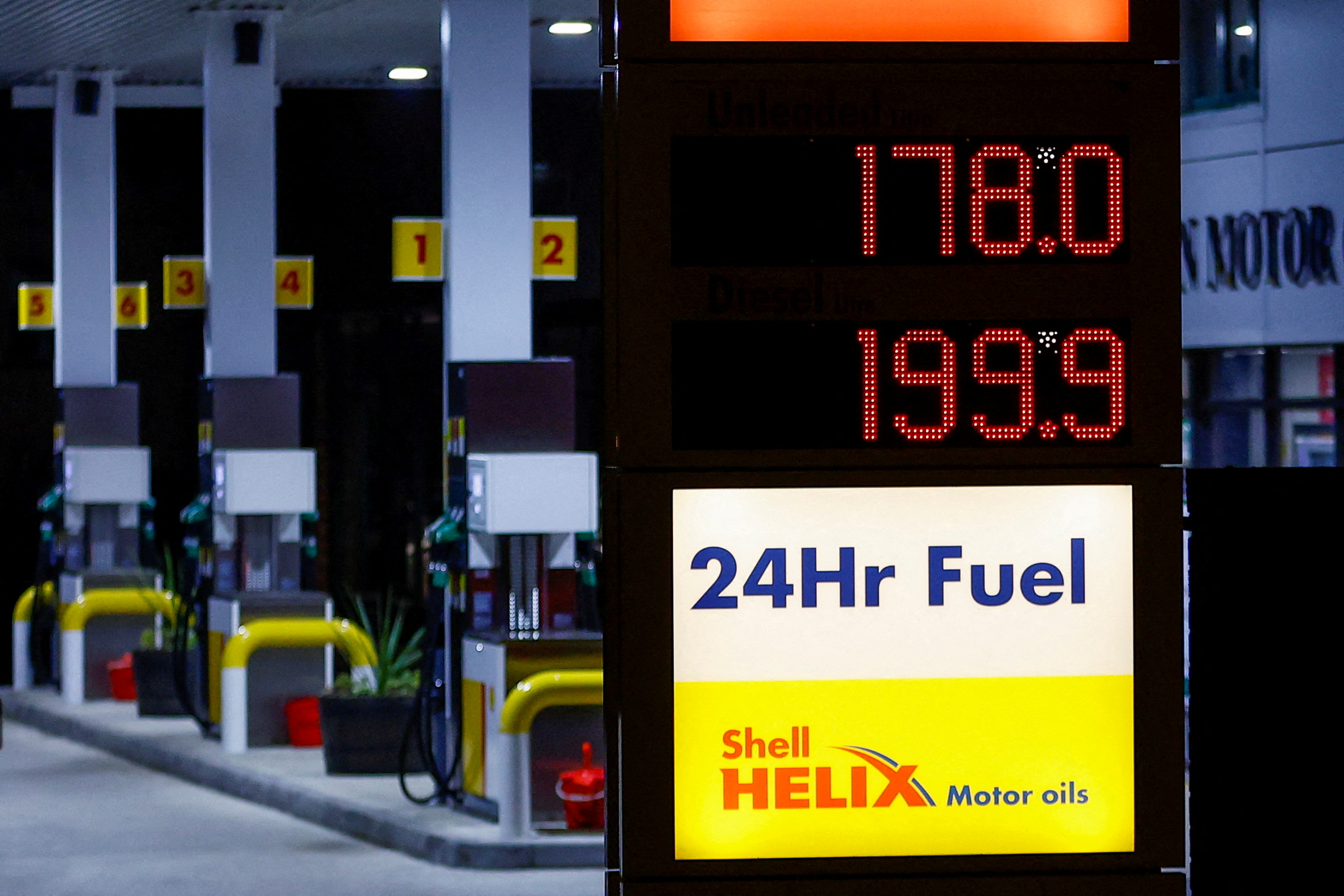 Increased fuel prices are displayed at a filling station as Russia's invasion of Ukraine continues, in Long Stratton