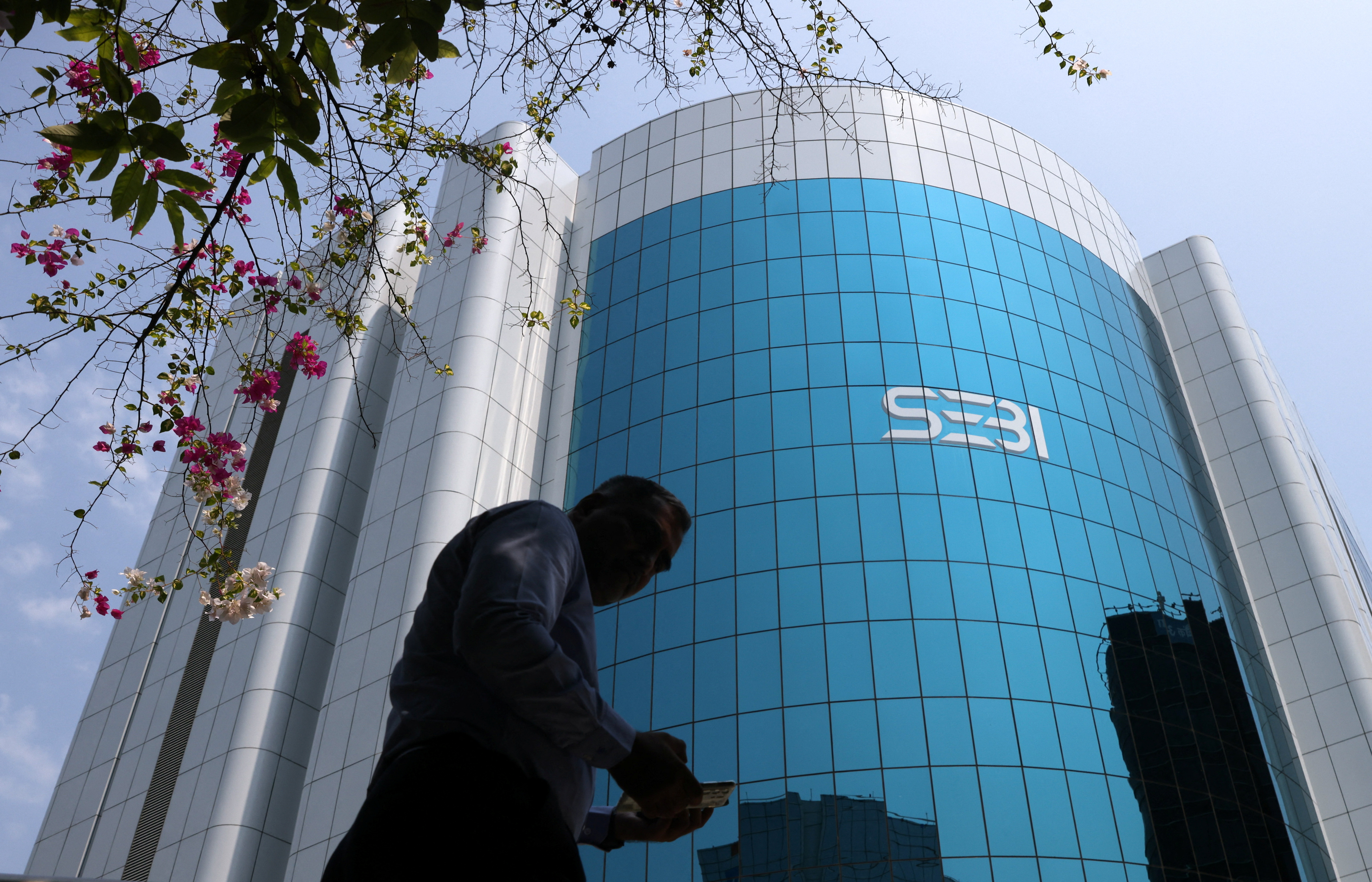 A man walks past the Securities and Exchange Board of India (SEBI) headquarters in Mumbai