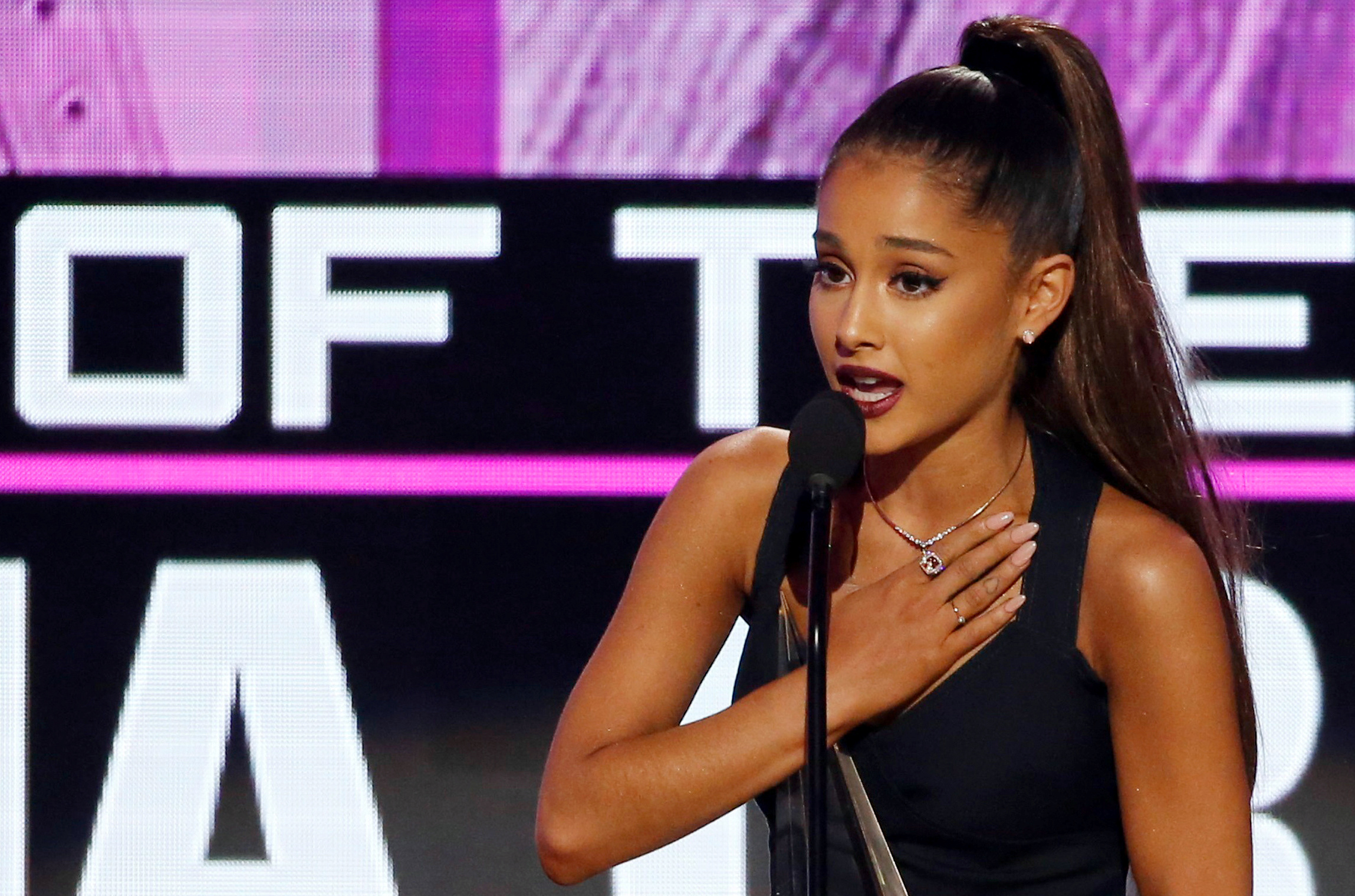 Grande accepts the award for artist of the year at the 2016 American Music Awards in Los Angeles