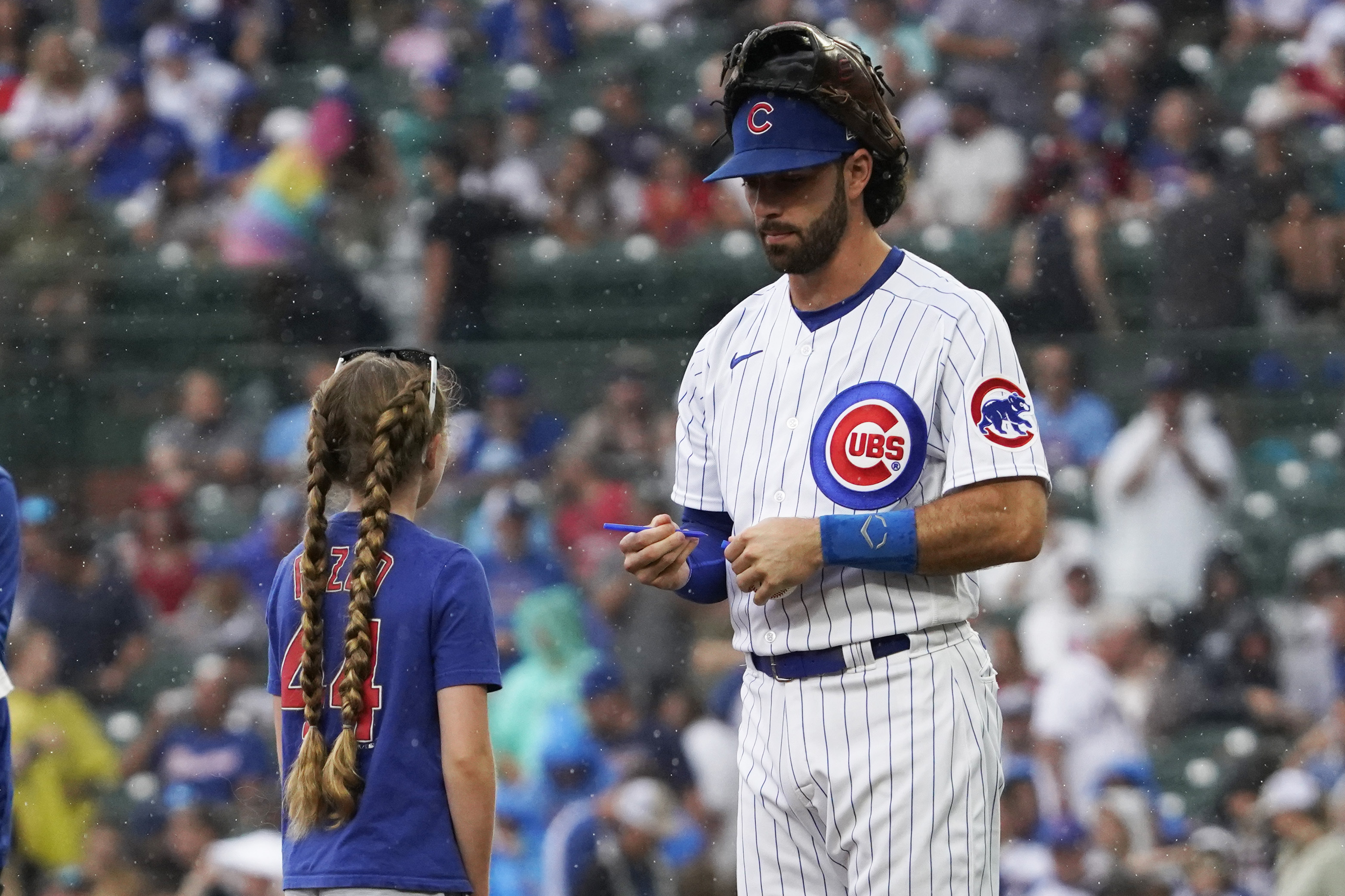 Swanson and Candelario go deep as the Cubs hold off the Braves 8-6 at rainy  Wrigley