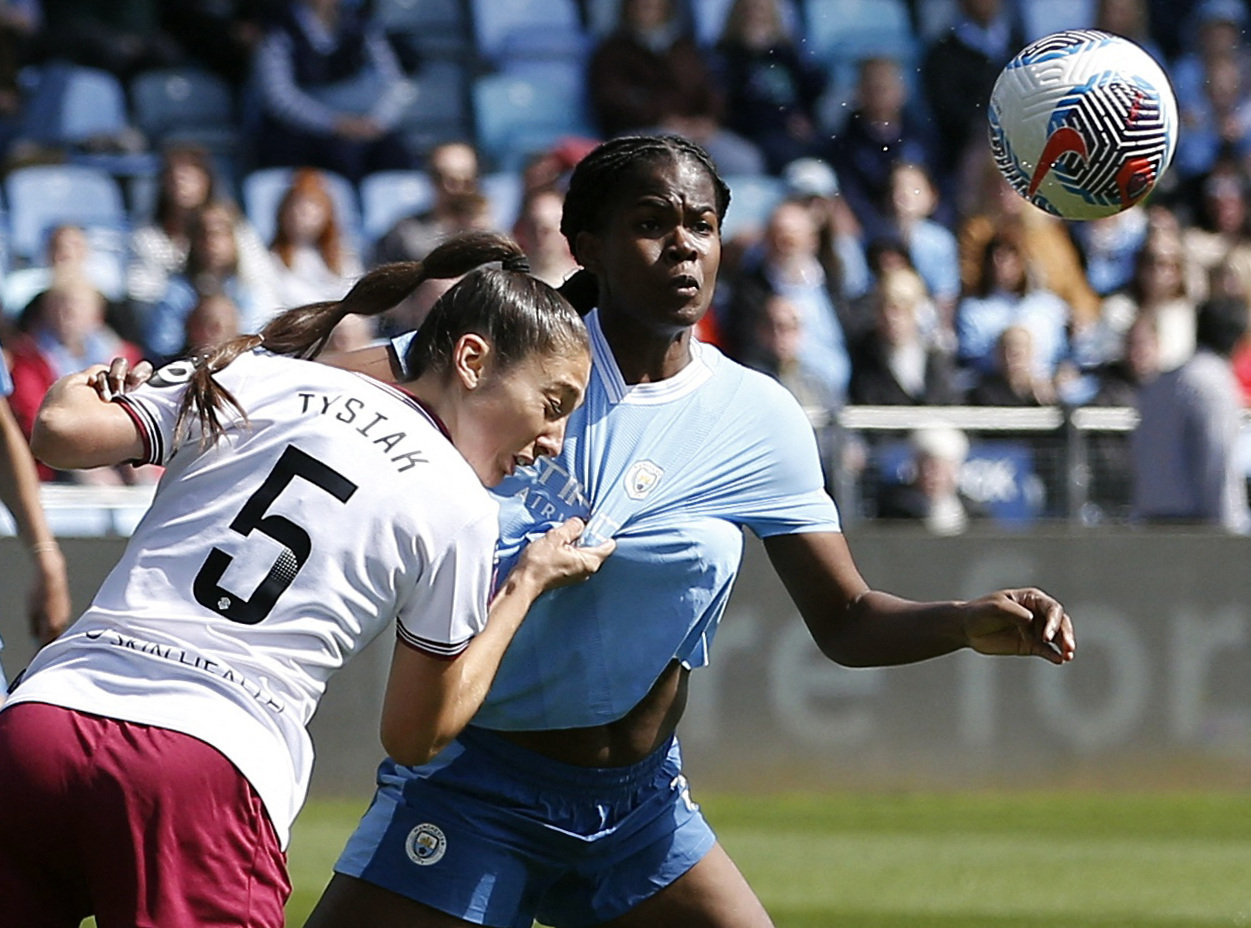 Man City thrash West Ham to go top of Women's Super League | Reuters