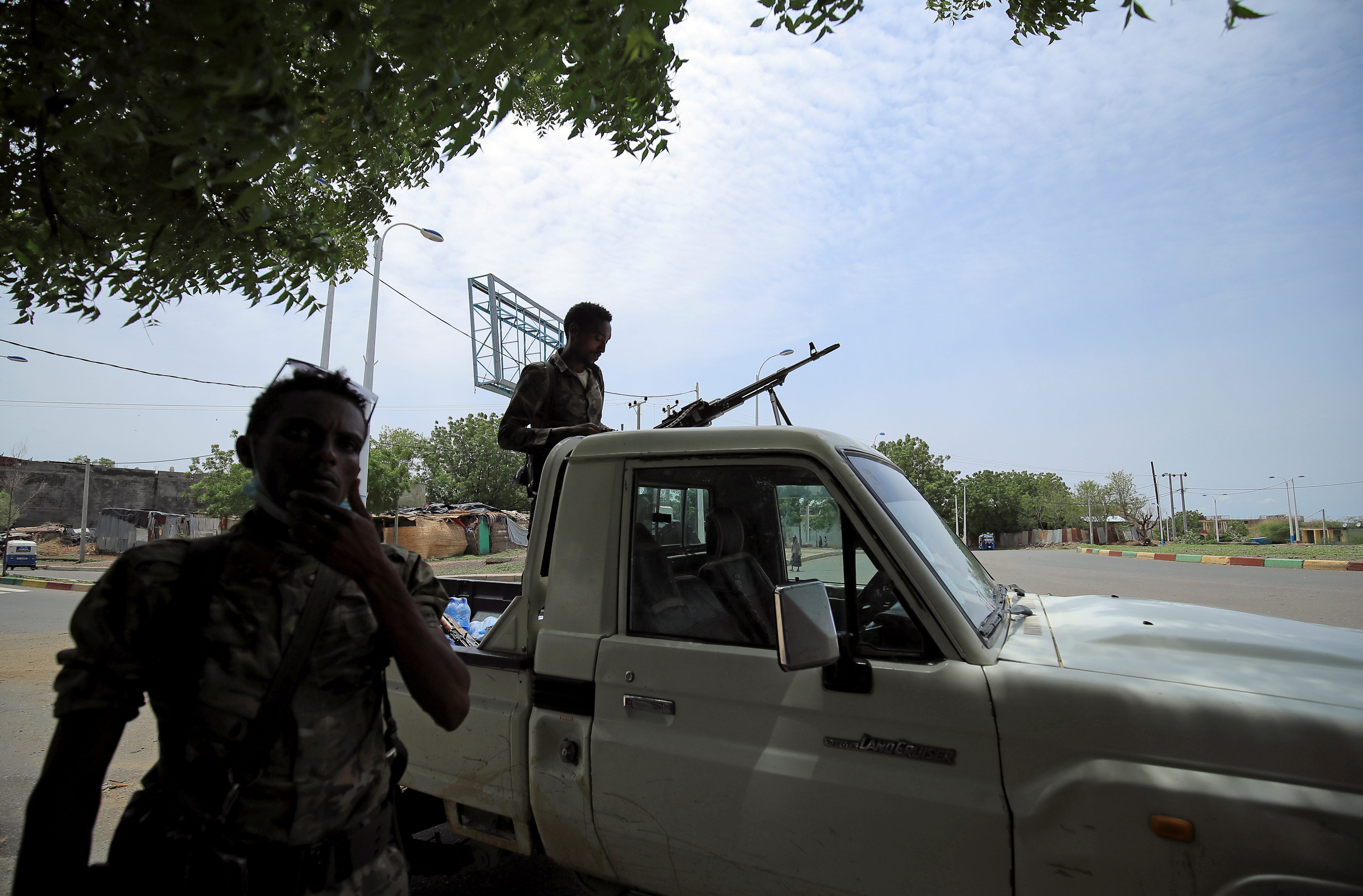 Members of Amhara special forces stand along a street in Humera town,