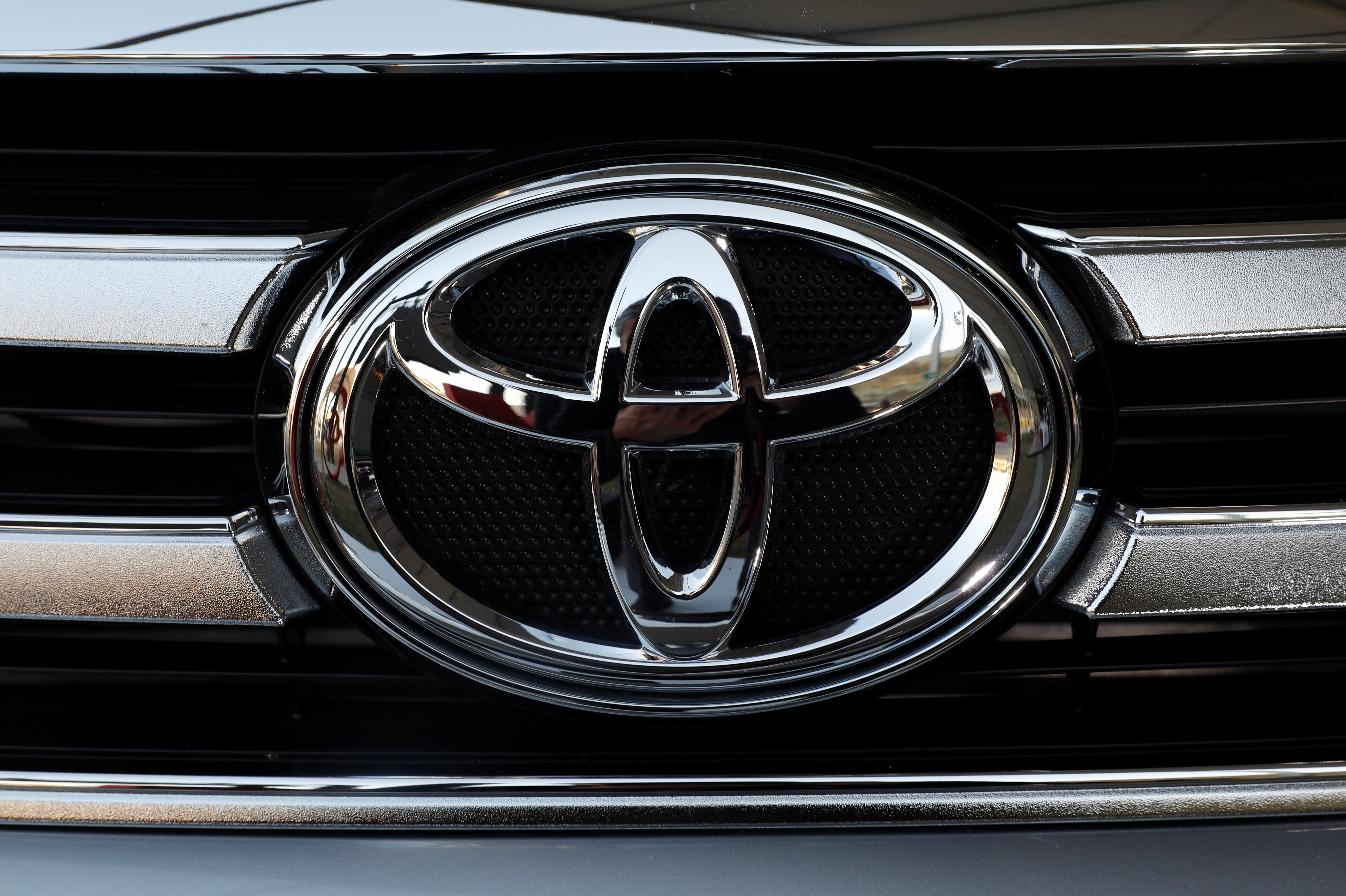 A Toyota Motor Corp. logo is seen on a car at the International Auto Show in Mexico City