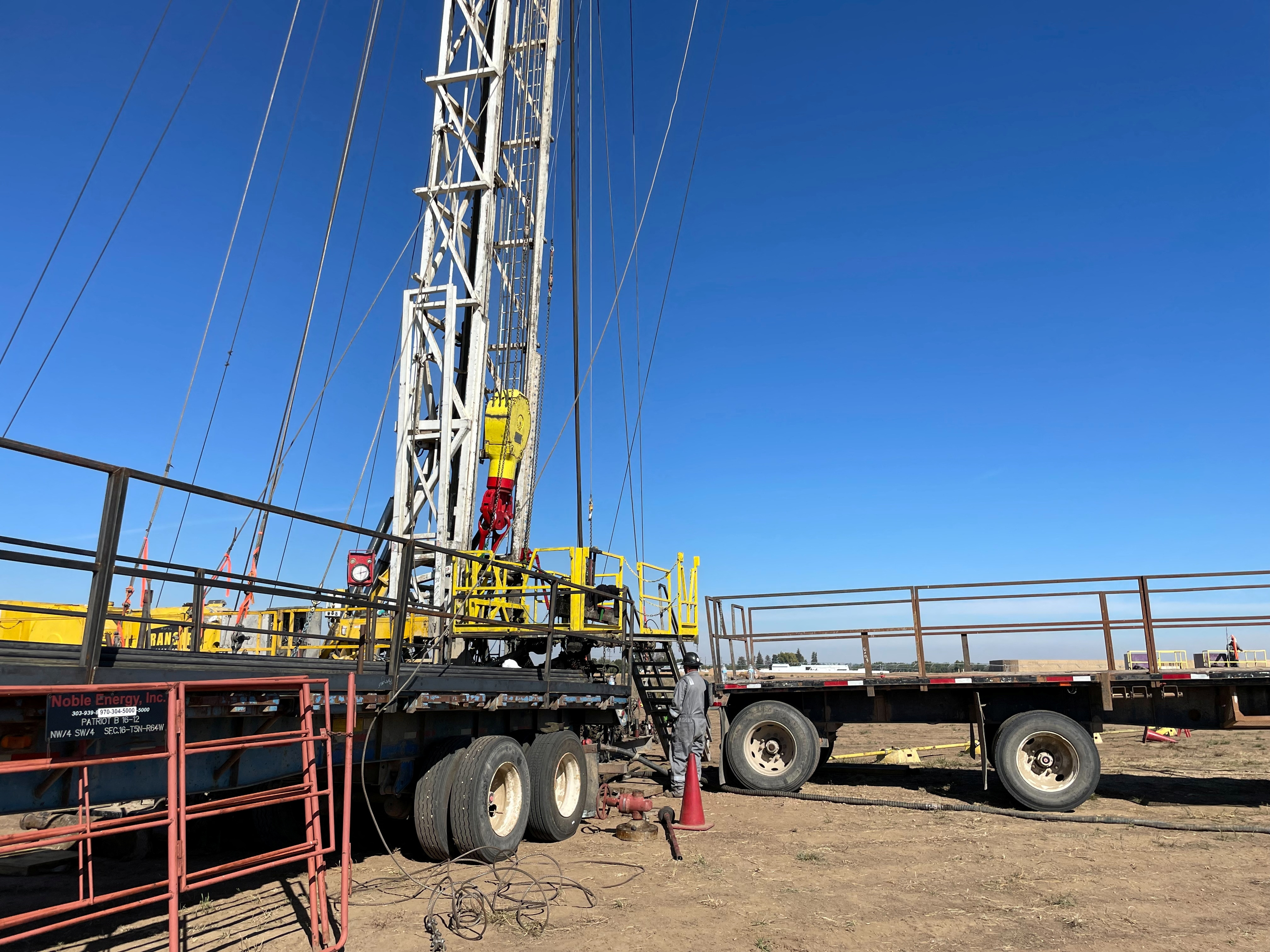 A workover rig removes an old well at a Chevron site in Kersey