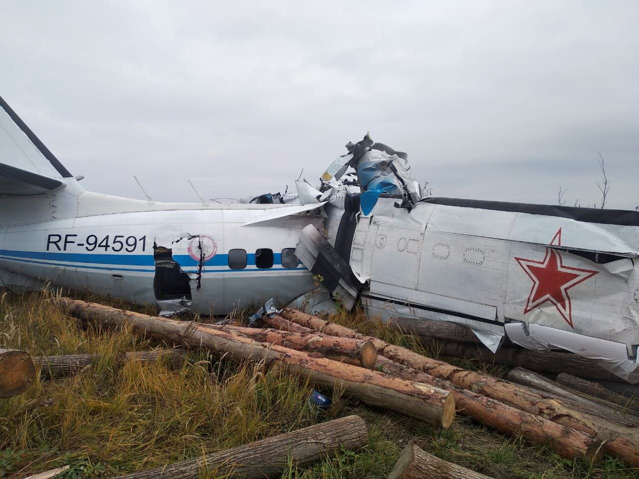 The wreckage of the L-410 plane is seen at the crash site near Menzelinsk