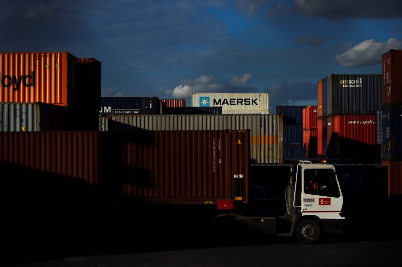 Shipping freight containers are transported at Dublin Port in Dublin, Ireland, September 24, 2018. REUTERS/Clodagh Kilcoyne/File Photo